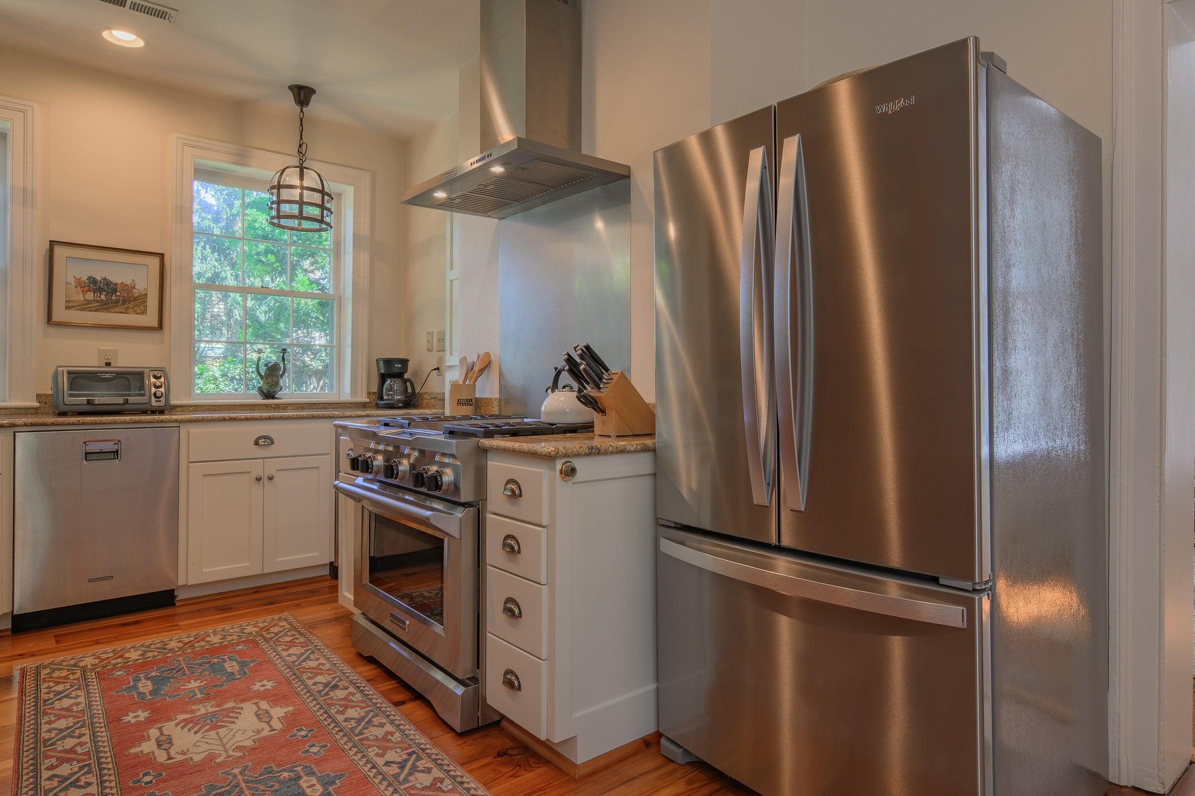 Featuring top-of-the-line appliances and granite countertops. Featuring top-of-the-line appliances and granite countertops.