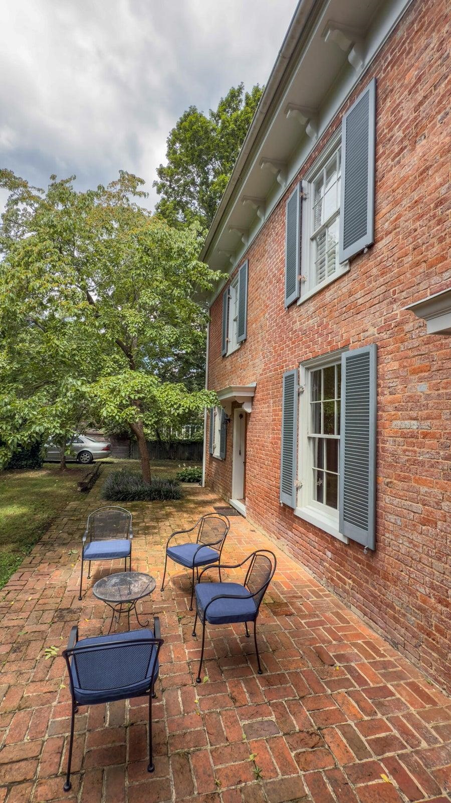 Brick patio for enjoying a glass of wine or cup of coffee. Brick patio for enjoying a glass of wine or cup of coffee.
