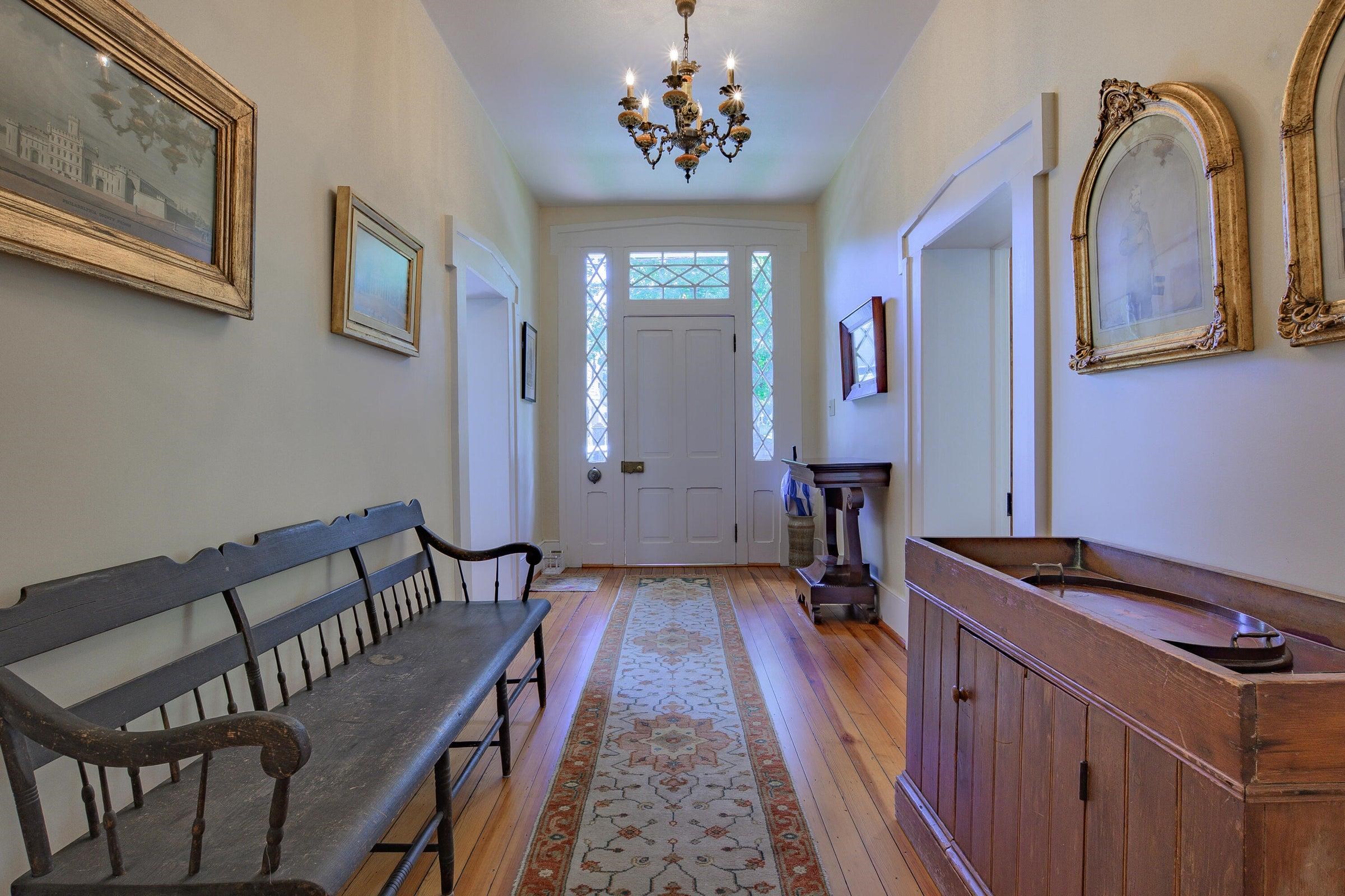This 19th-century treasure showcases authentic period details including period doorbells, intricate locks, chandeliers, fireplaces, and gleaming heart-of-pine floors. This 19th-century treasure showcases authentic period details including period doorbells, intricate locks, chandeliers, fireplaces, and gleaming heart-of-pine floors.