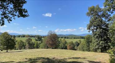 Panoramic, layered views looking West and South from homesite