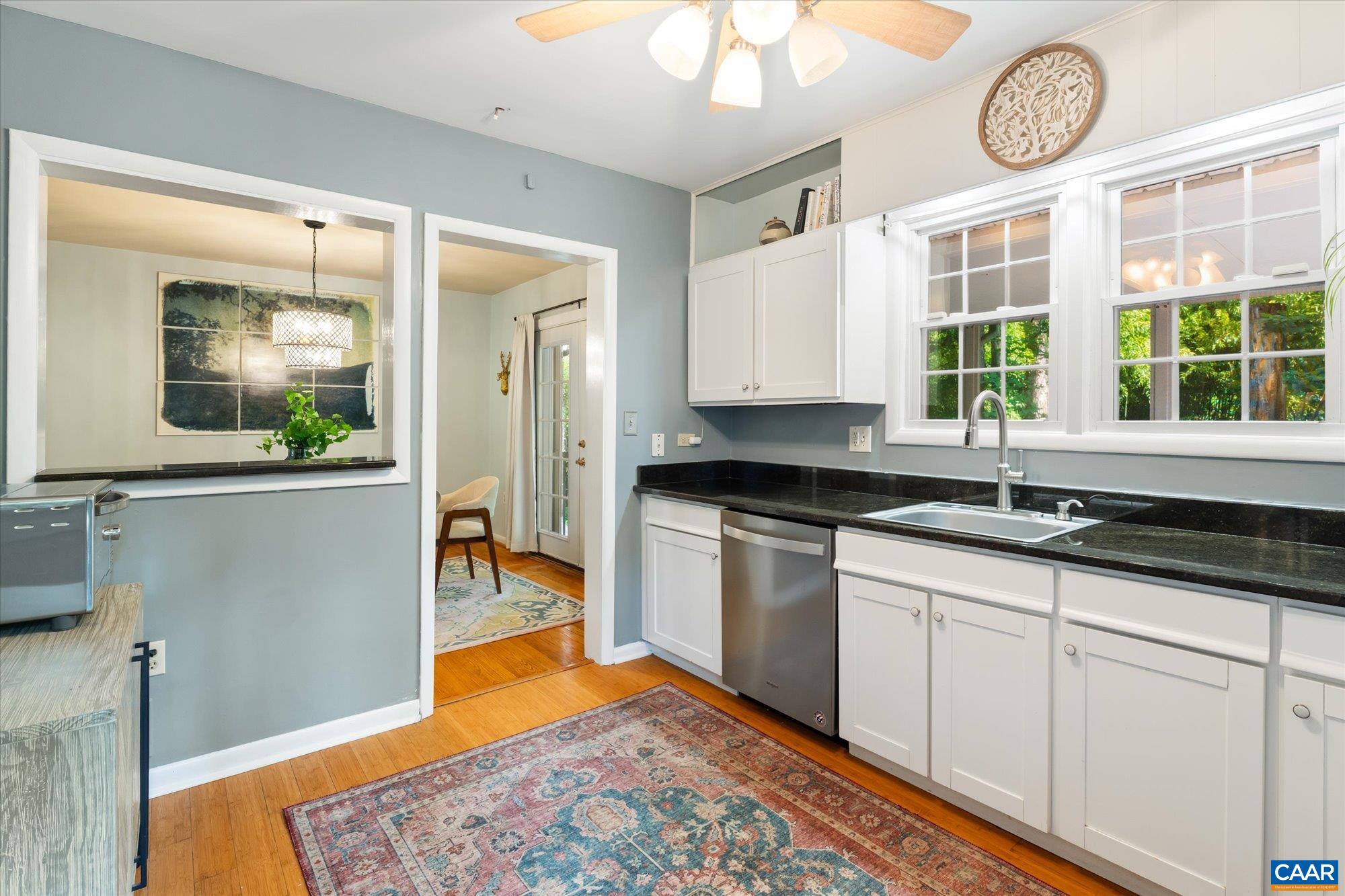 Open to the diningroom and back screened in porch. Open to the diningroom and back screened in porch.