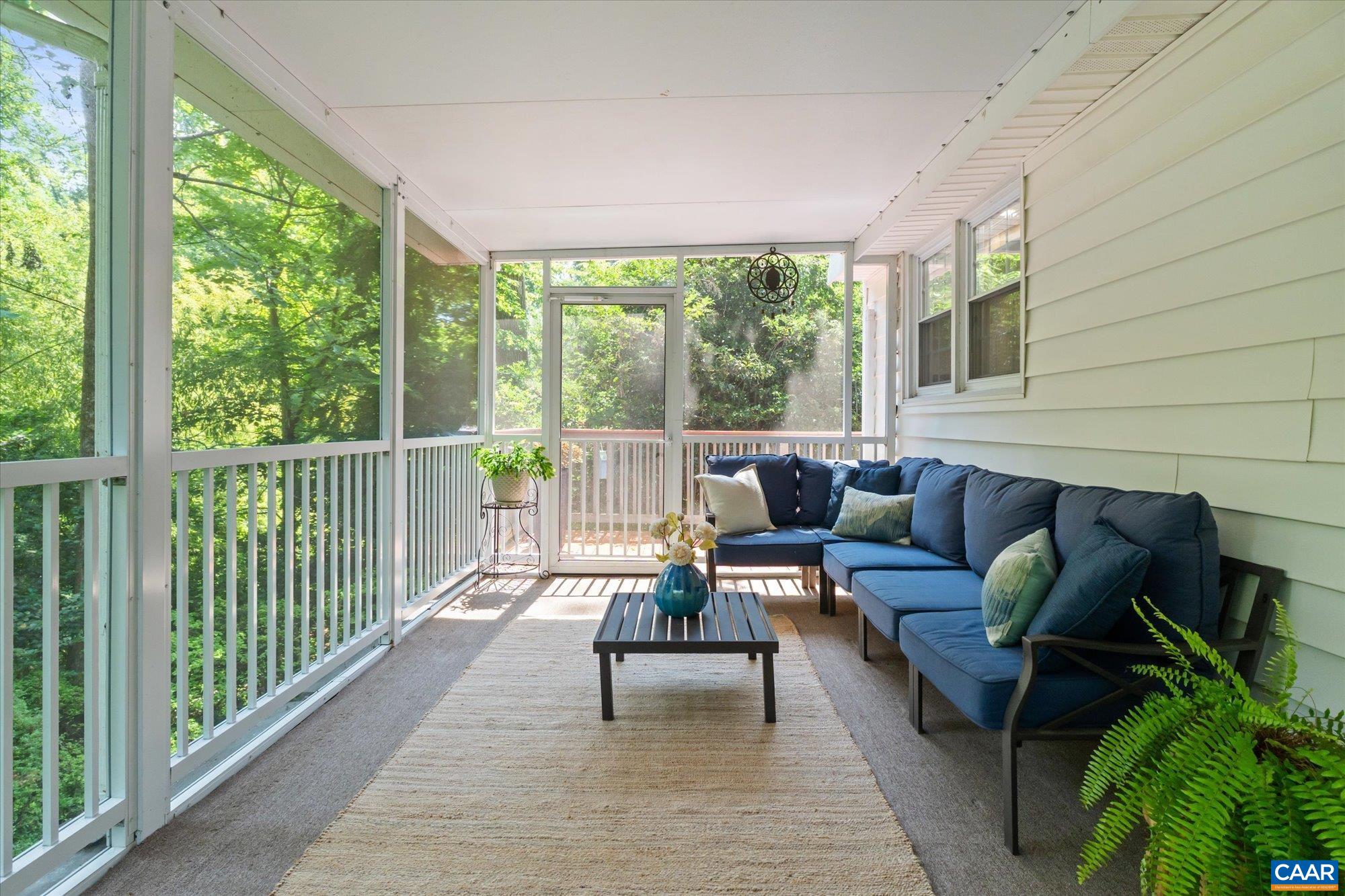 A large, comfortable spot to watch the birds, backyard fun or host a party. Imagine a future mudroom where the current deck is! A large, comfortable spot to watch the birds, backyard fun or host a party. Imagine a future mudroom where the current deck is!