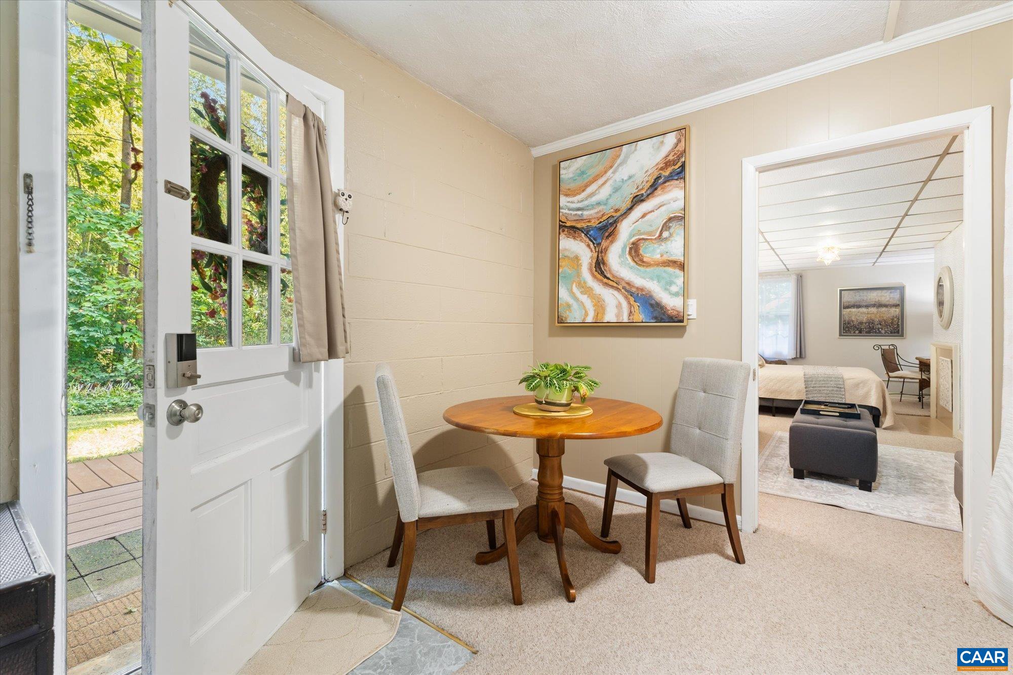This entry is accessed through the family room via a door that can be locked and has its own entrance. This is the breakfast nook that serves as the eating area for the apartment. This entry is accessed through the family room via a door that can be locked and has its own entrance. This is the breakfast nook that serves as the eating area for the apartment.