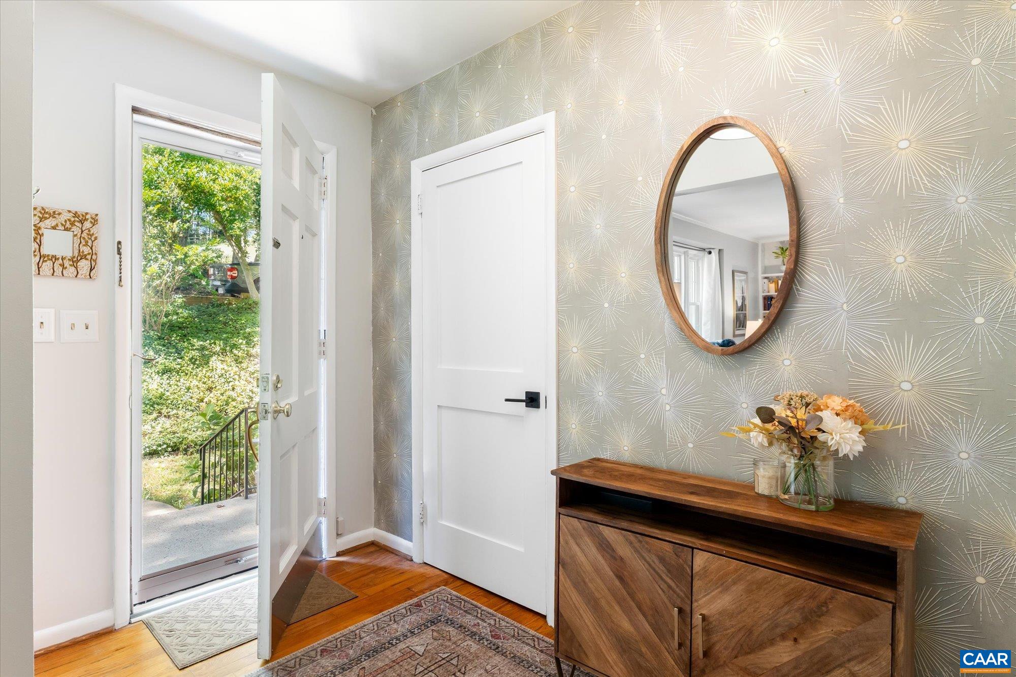A welcoming entrance with a large coat closet. A welcoming entrance with a large coat closet.