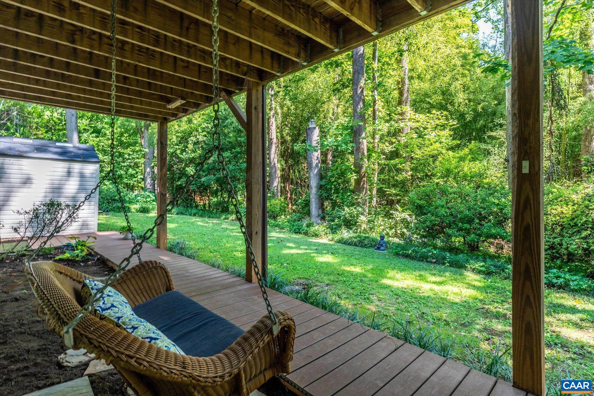 Beyond the garden Buddha is a larger expanse of the yard across a small creek. Build that bridge to Terabithia and set up the trampoline, fire pit, a sweet tree house or just let it remain in its natural state and enjoy less maintenance. Beyond the garden Buddha is a larger expanse of the yard across a small creek. Build that bridge to Terabithia and set up the trampoline, fire pit, a sweet tree house or just let it remain in its natural state and enjoy less maintenance.