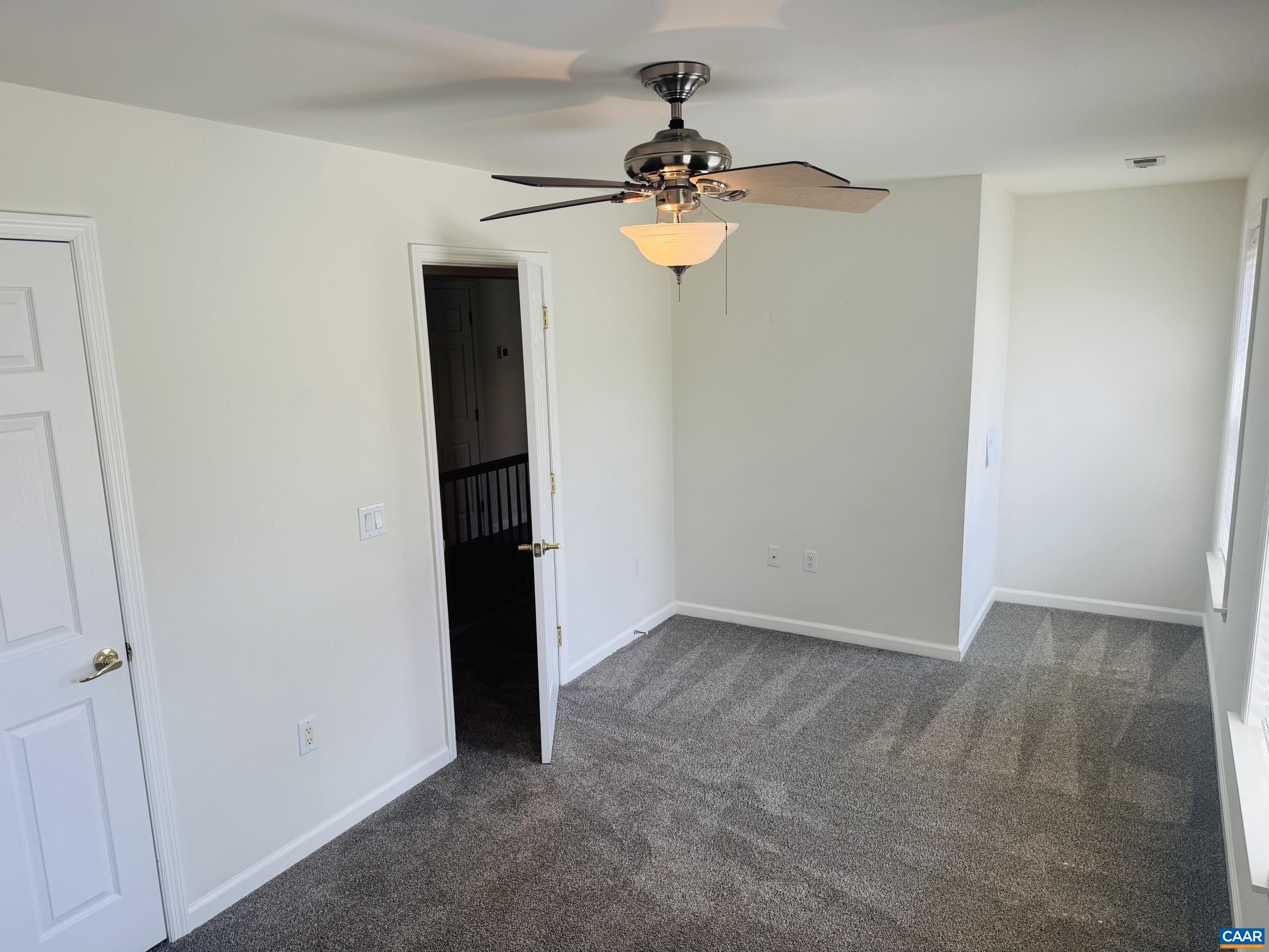 with walk-in closet with walk-in closet