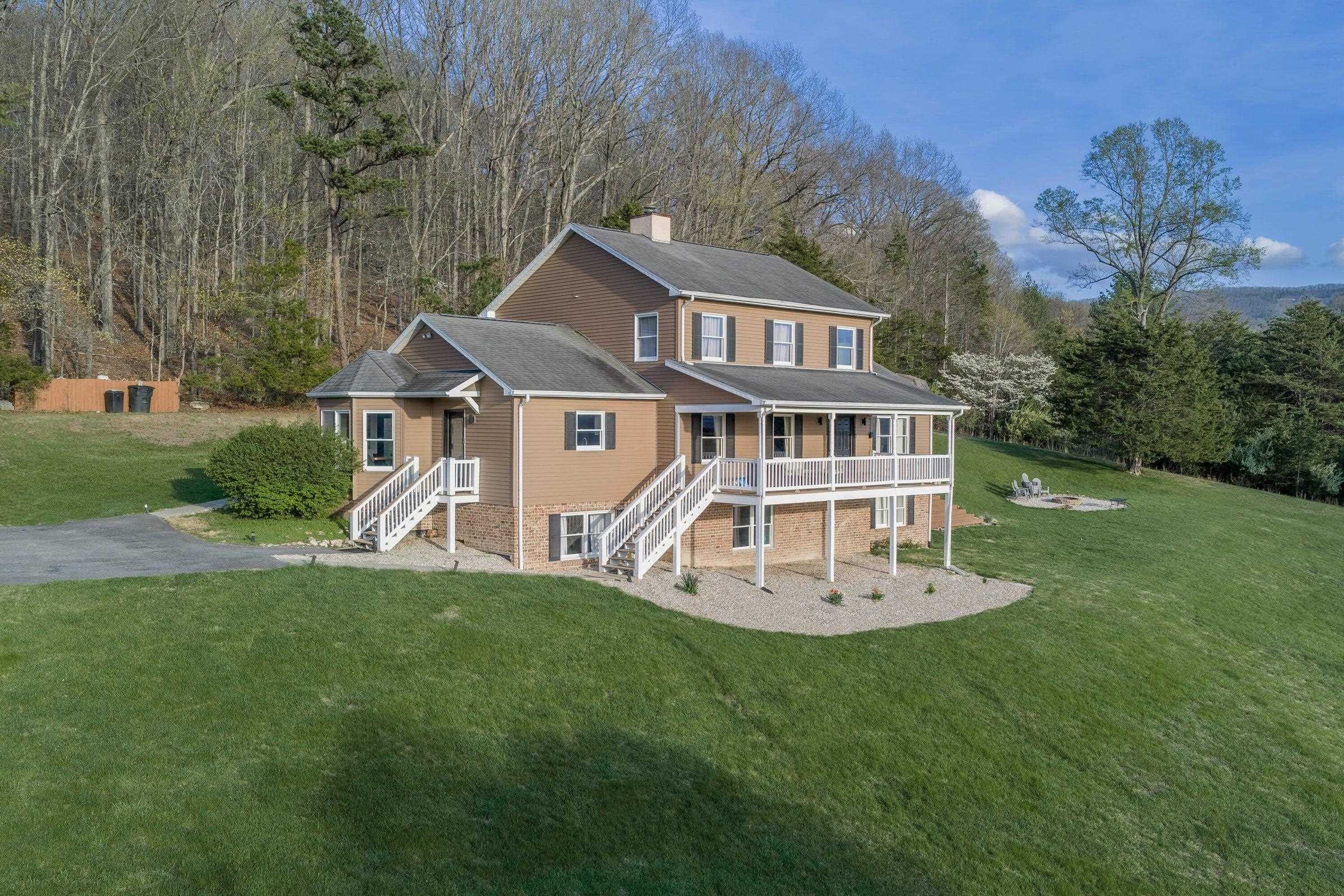Tucked into the side of the impressive Blue Ridge Mountains is 377 Rattler Rd.