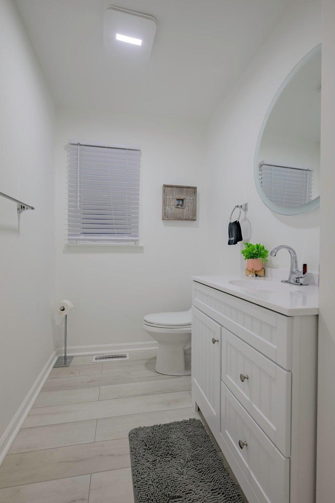 Half bath off the hallway on the main level.