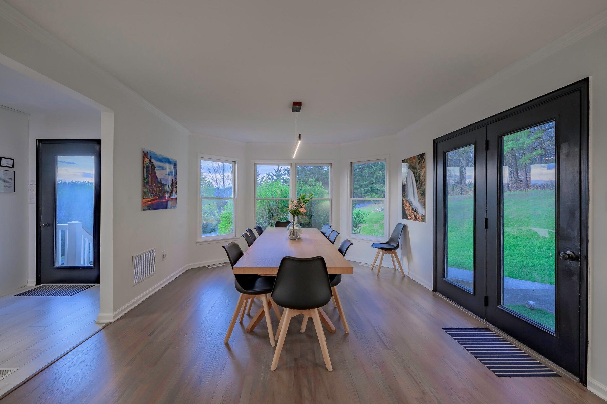 Back doors lead to the rear patio. Bump out windows invite the light and provide the views.