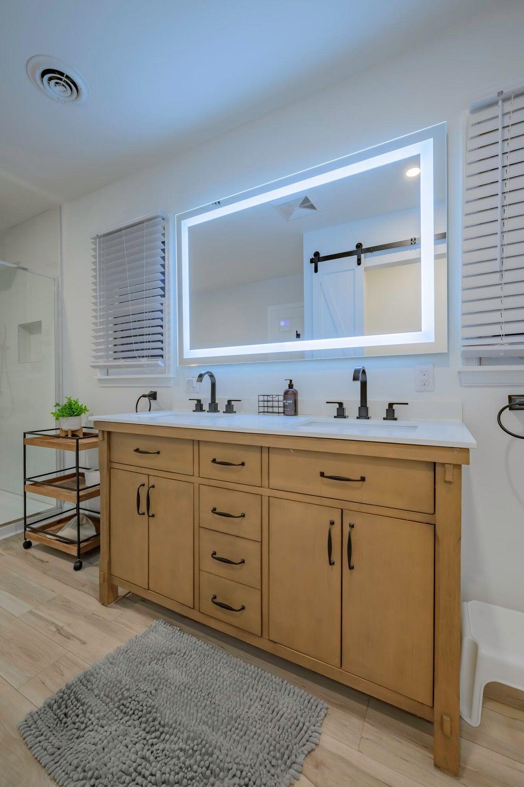 Notice the lighted glass mirror. Amazing.