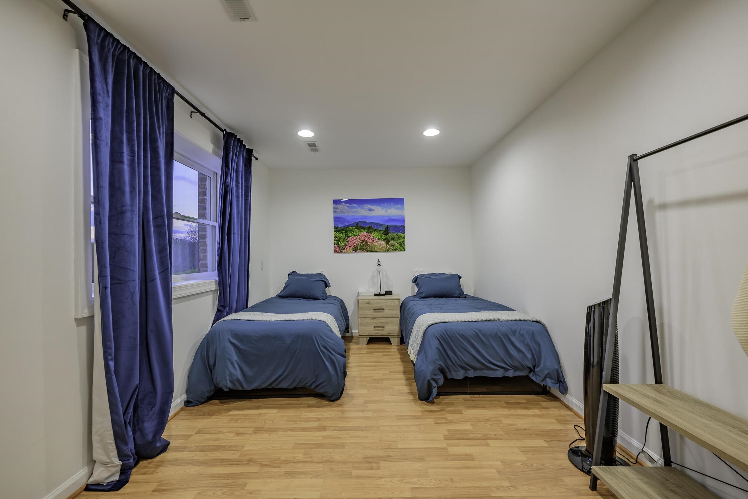 5th possible bedroom is featured on the Lower Level.