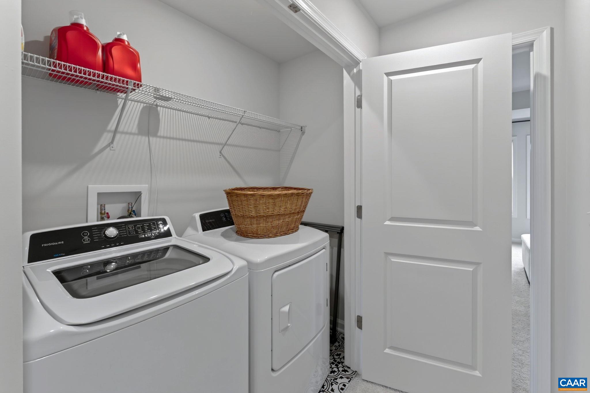 The laundry closet is conveniently located near the bedrooms The laundry closet is conveniently located near the bedrooms