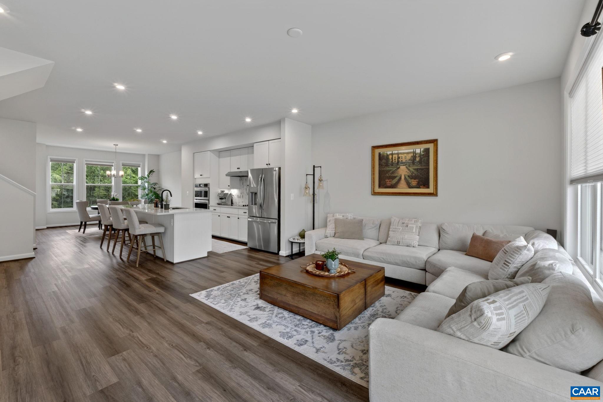 Easy maintenance LVP flooring runs throughout the main level Easy maintenance LVP flooring runs throughout the main level