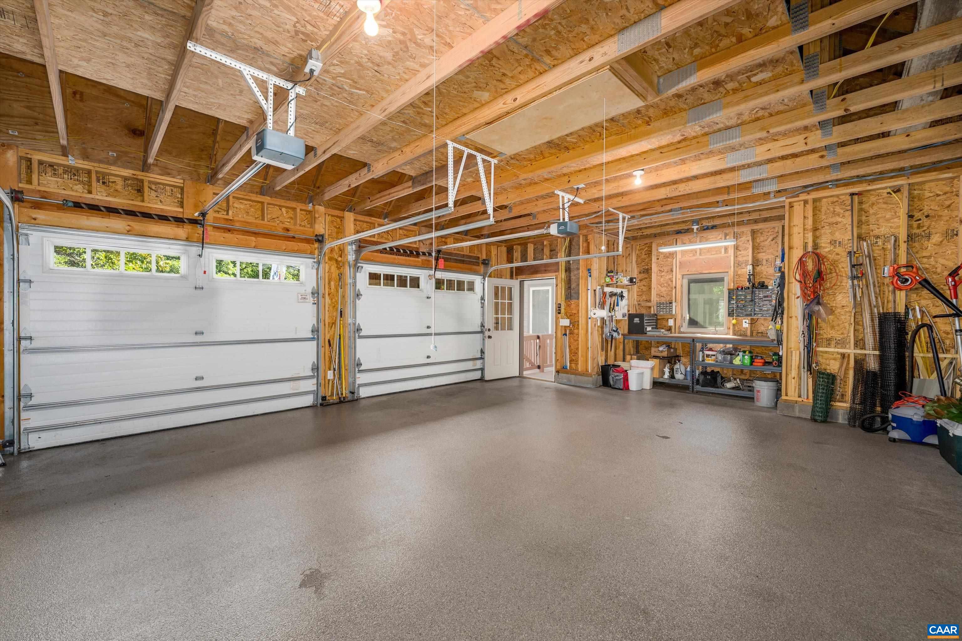 Two car plus garage has polyaspartic sealed floor Two car plus garage has polyaspartic sealed floor