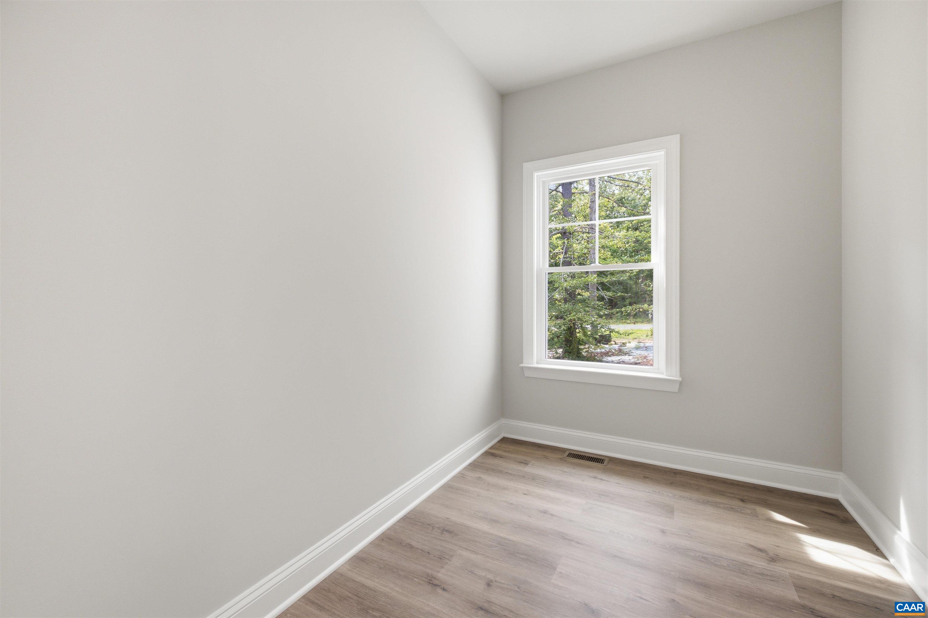 Entrance to 2-car garage. Photo of for-sale home, staged.