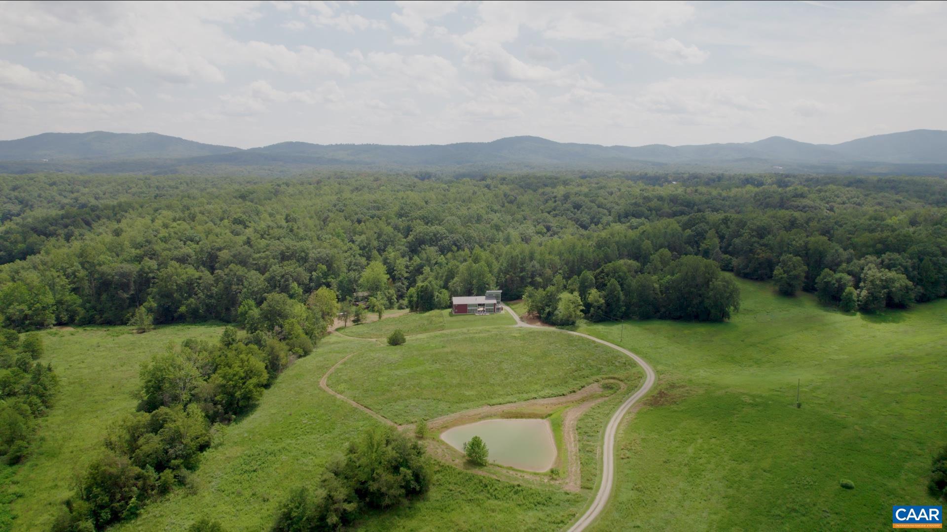 From the front of the property with pond, home, and rolling piedmont beyond. From the front of the property with pond, home, and rolling piedmont beyond.