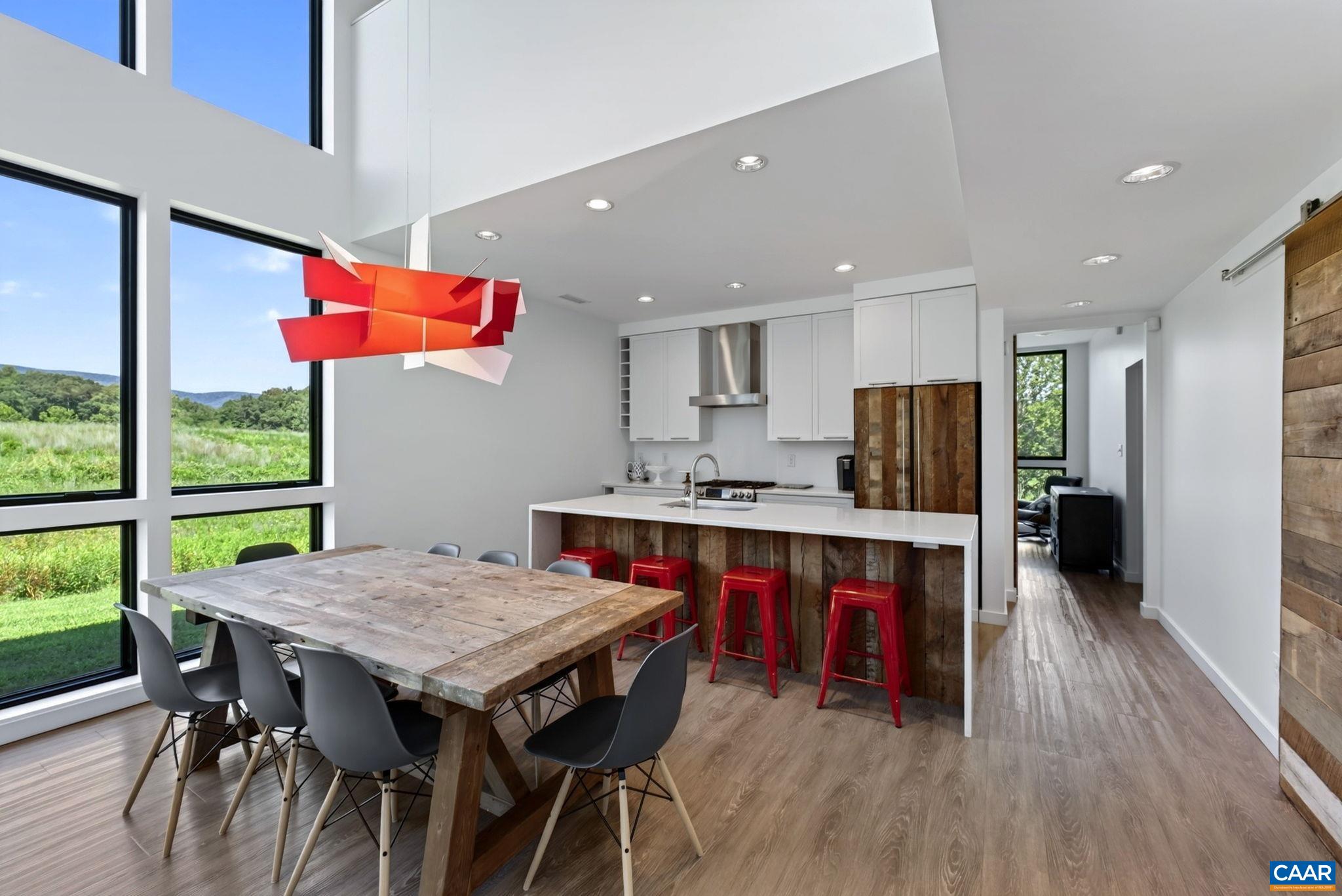 Dining area and kitchen. Dining area and kitchen.