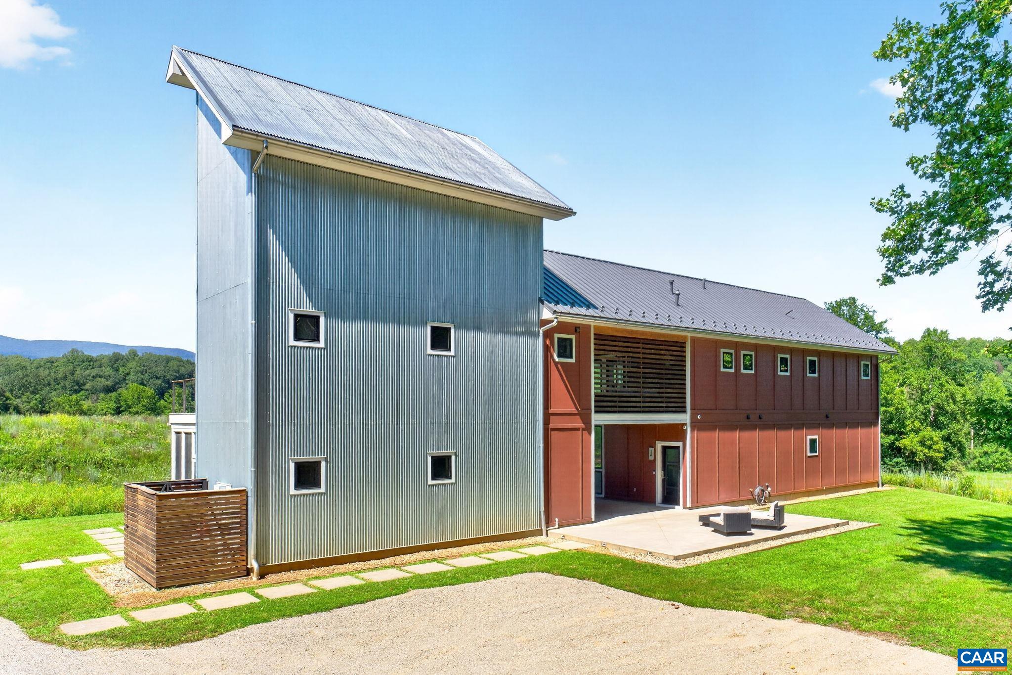 Galvanized steel and Hardie board siding with a metal roof. Galvanized steel and Hardie board siding with a metal roof.