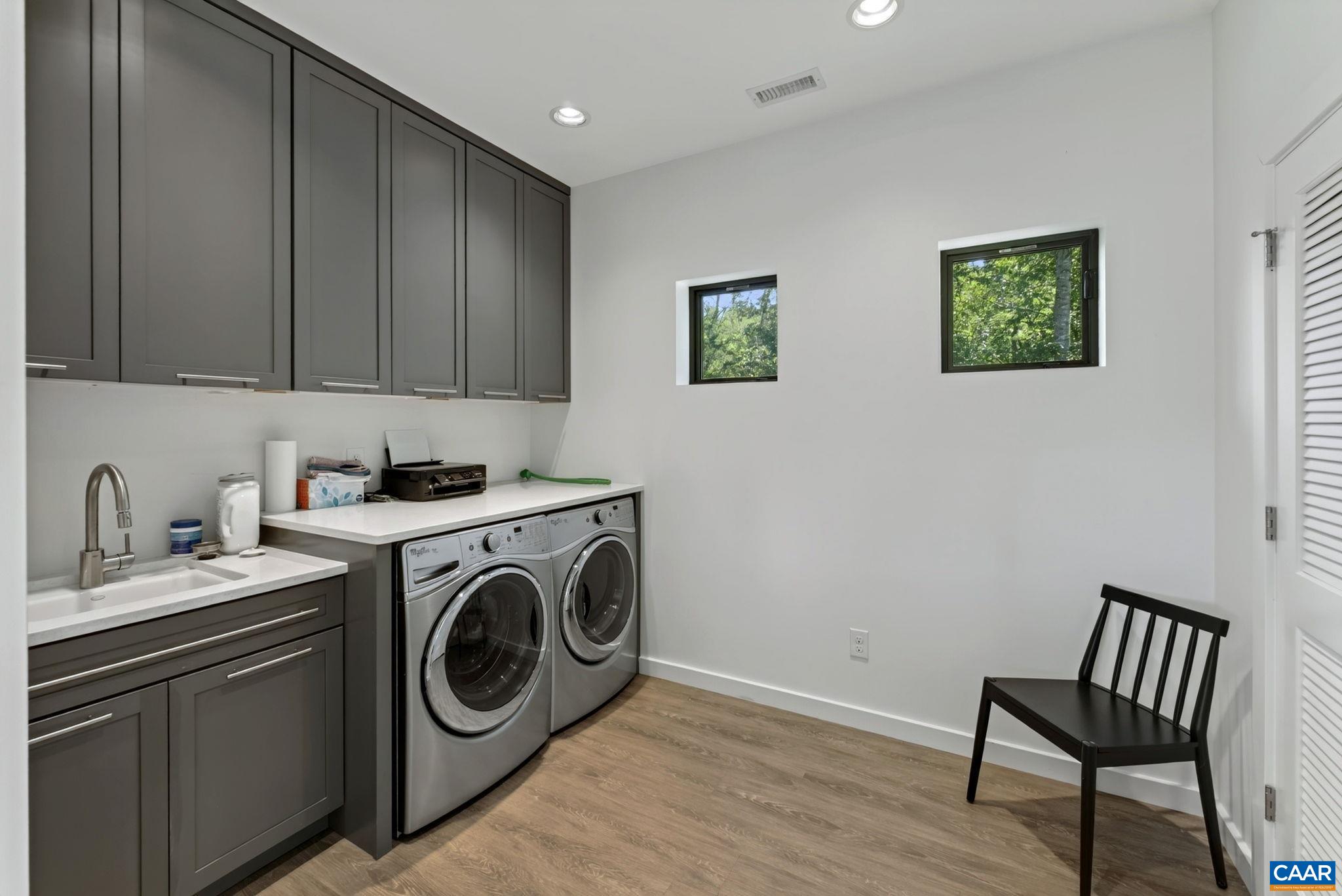 Upstairs laundry room. Upstairs laundry room.