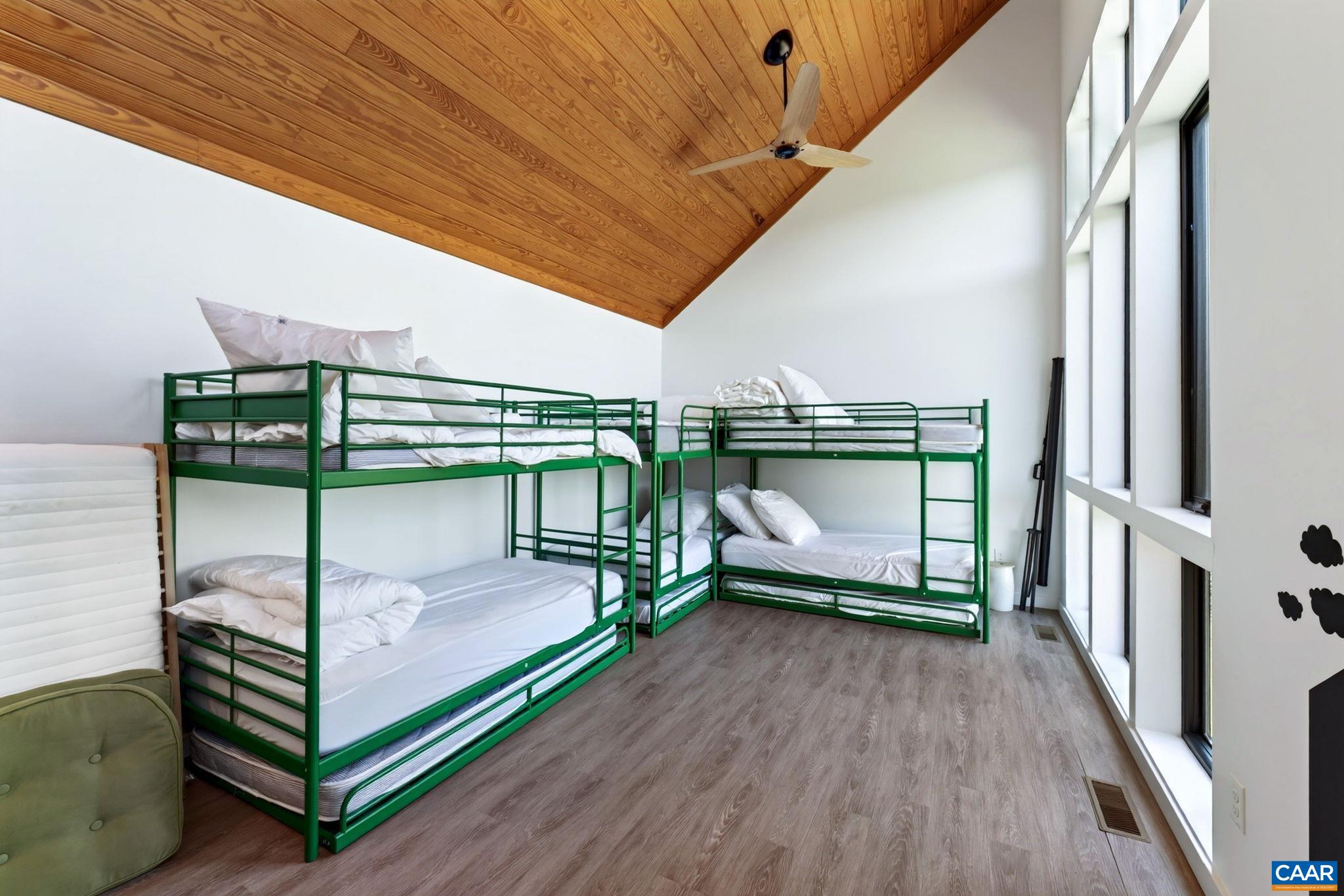 Third level with soaring ceiling currently can be used as a dorm room, or a stellar home office. Third level with soaring ceiling currently can be used as a dorm room, or a stellar home office.