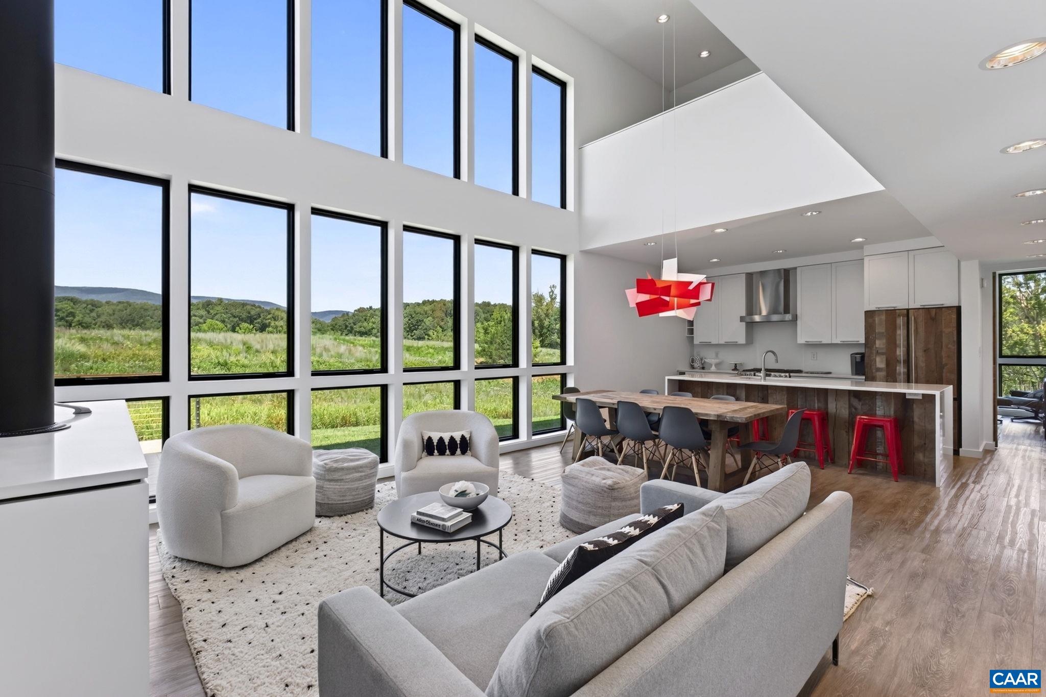 Living room, dining area and kitchen. Living room, dining area and kitchen.