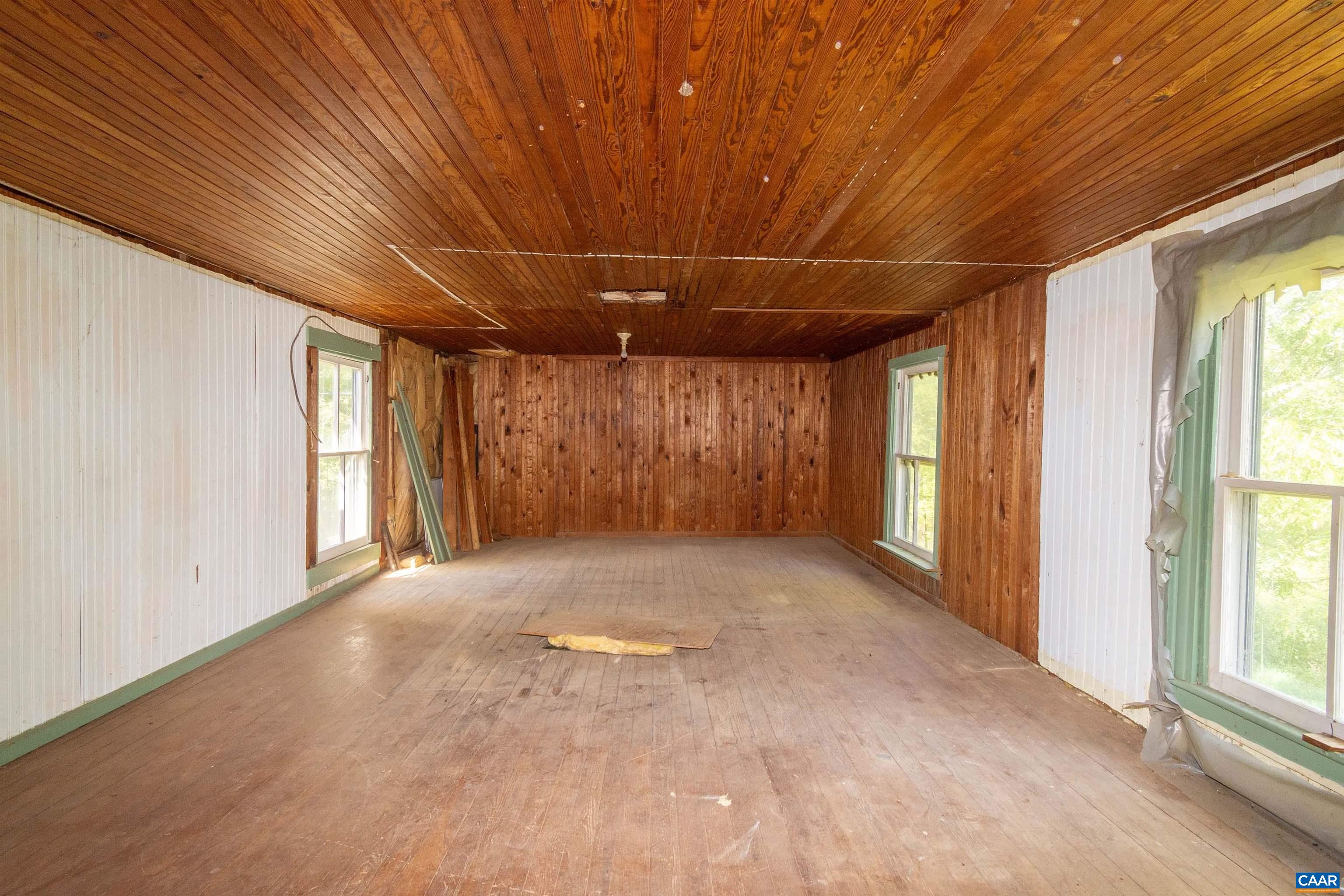 made by removing a center wall and combining what were originally two rooms. made by removing a center wall and combining what were originally two rooms.