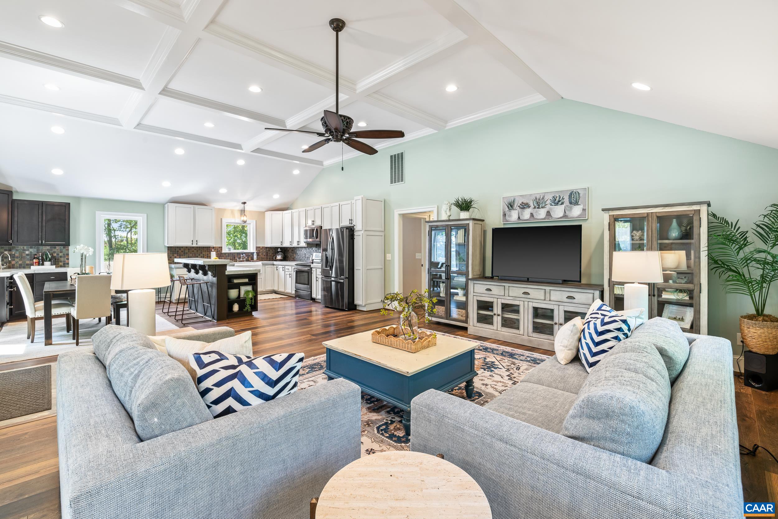Spacious seating area with direct view of kitchen Spacious seating area with direct view of kitchen