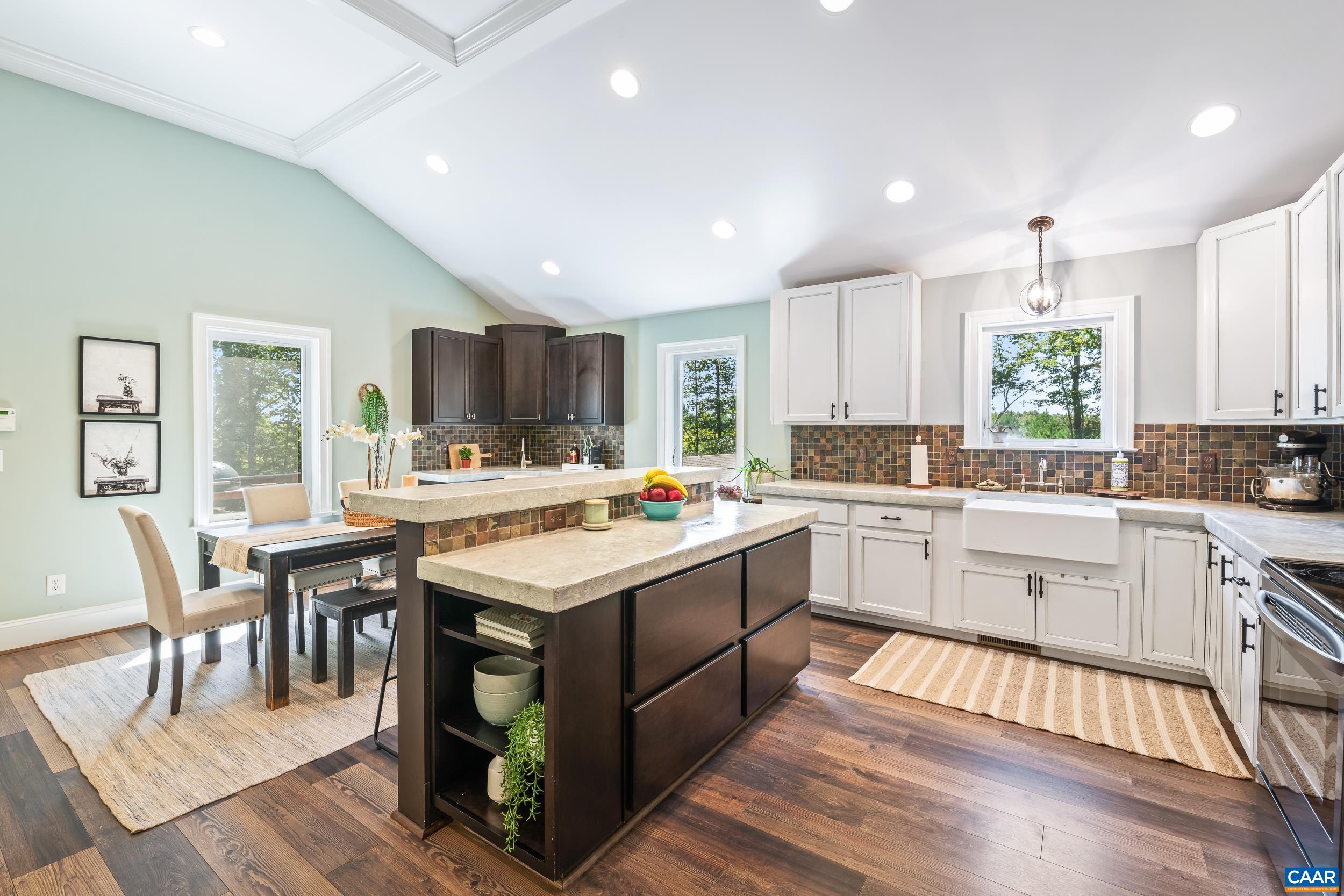 Oversized island with large pull out drawers and open shelving Oversized island with large pull out drawers and open shelving