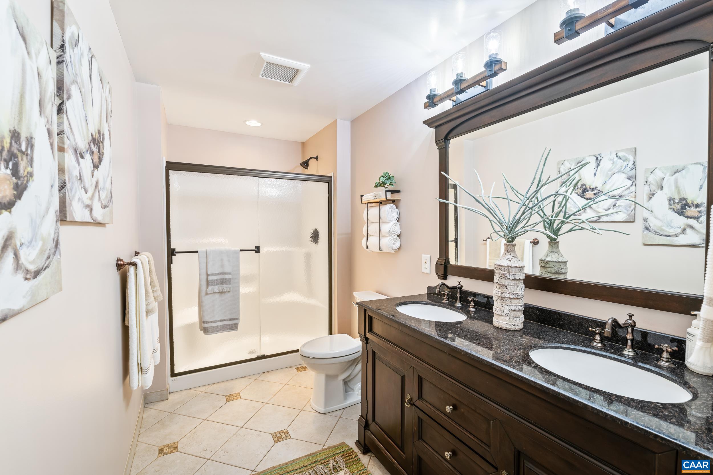 Large Shower, Double Vanity Tiled Floors Large Shower, Double Vanity Tiled Floors