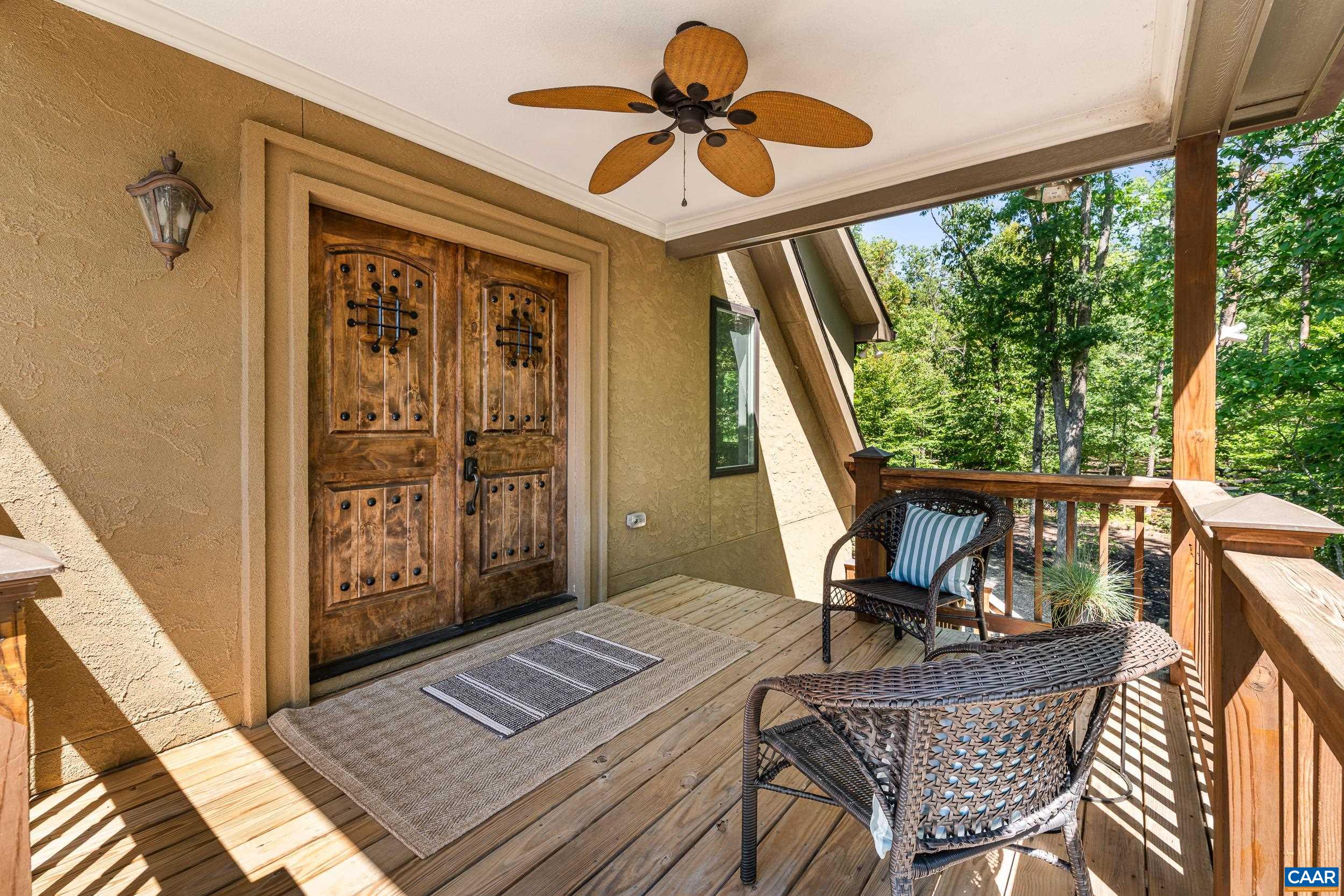 Private outdoor living area surrounded by mature trees, offering a peaceful setting for relaxing and entertaining. Private outdoor living area surrounded by mature trees, offering a peaceful setting for relaxing and entertaining.