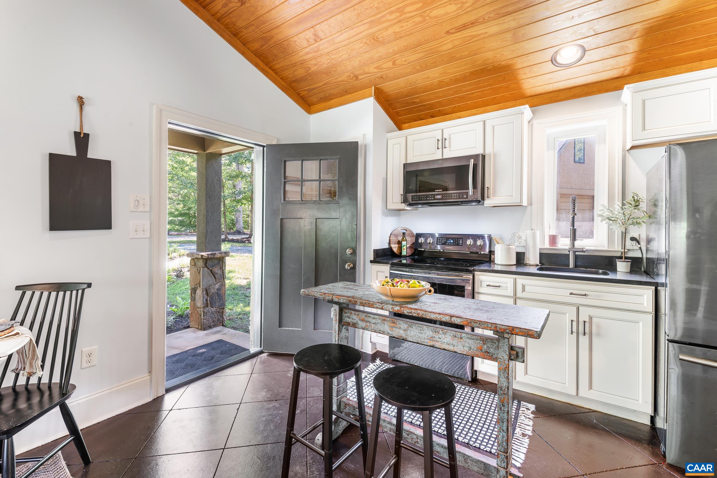 Kitchen and family room Kitchen and family room