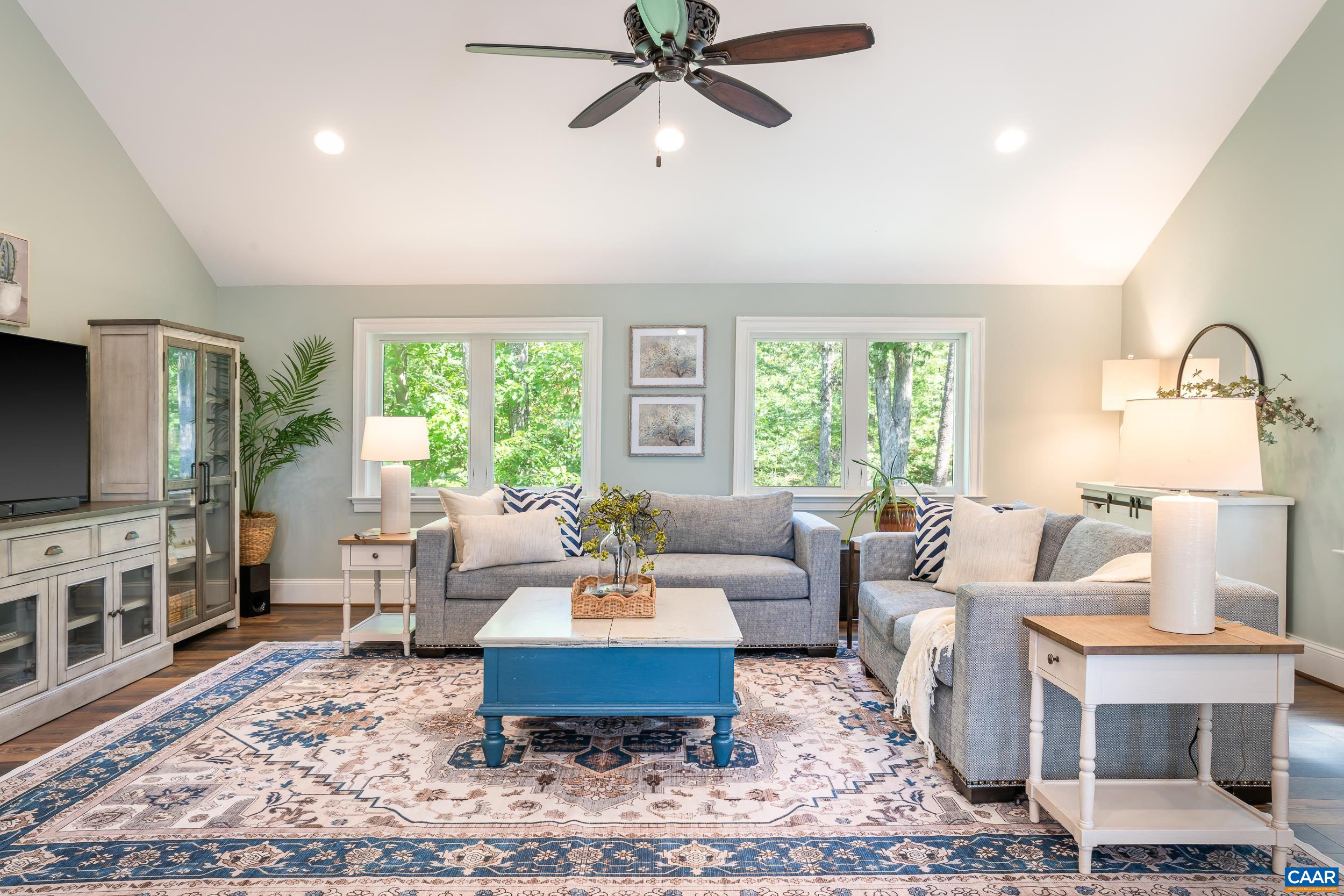 Bright family room with large Anderson windows Bright family room with large Anderson windows