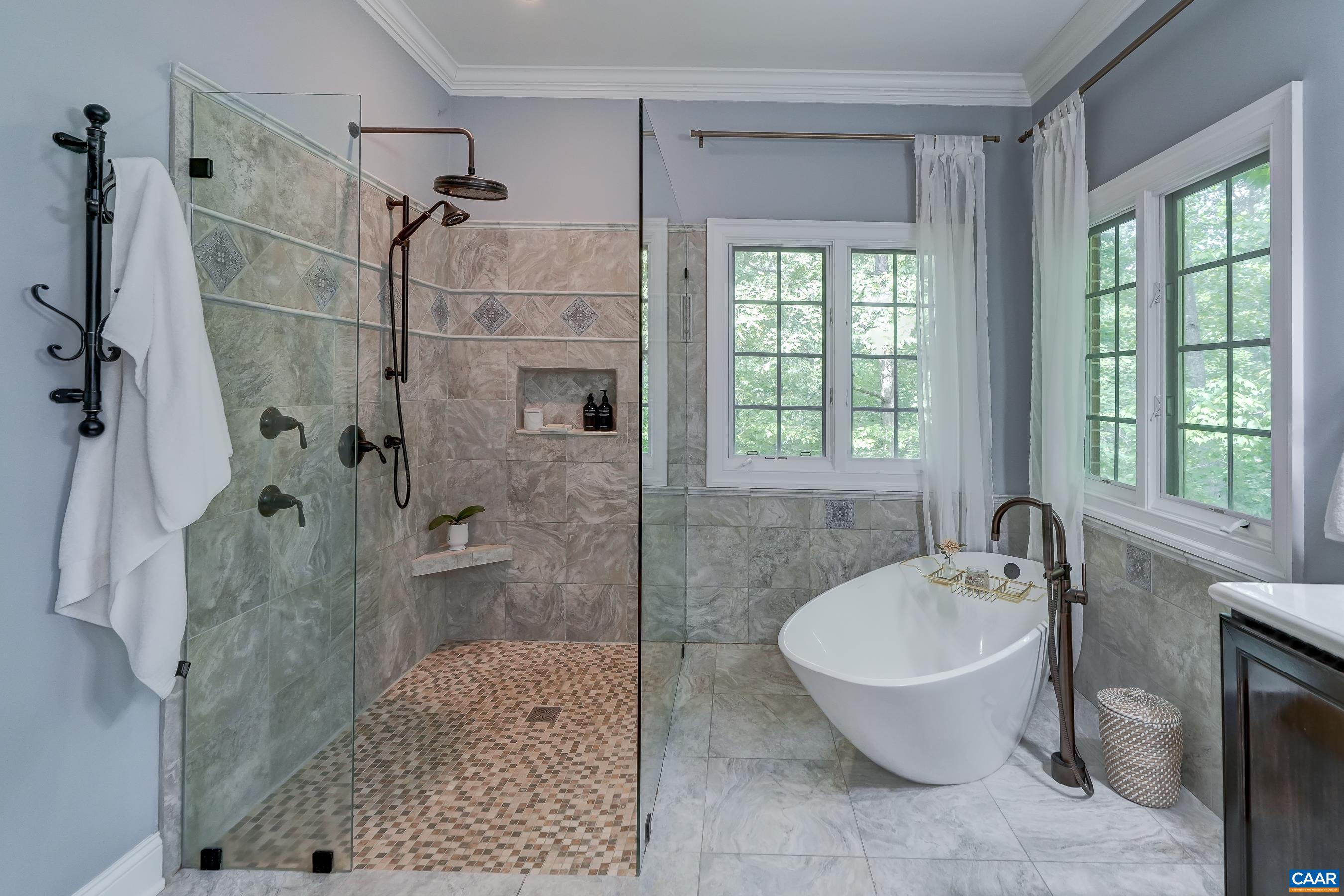 Garden soaking tub, glass enclosed tile shower and tile floors. Garden soaking tub, glass enclosed tile shower and tile floors.