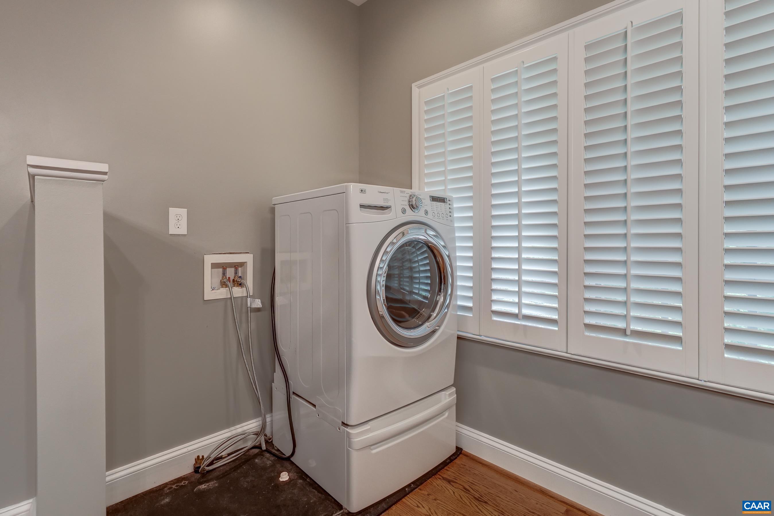 Washer/dryer unit in Hall bathroom Washer/dryer unit in Hall bathroom