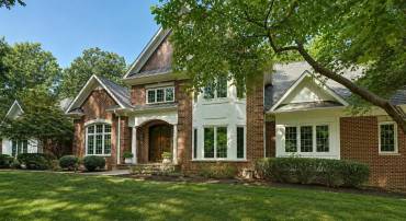 Ideally positioned on a quiet wooded corner lot in Glenmore.