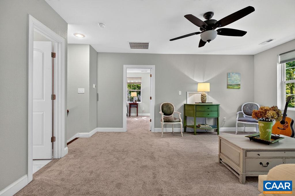 centered between 2 bedrooms & bath