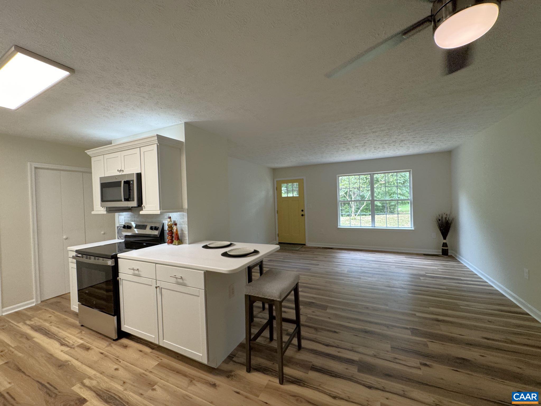 Open Floor Plan - Kitchen, Dining, and Living Room all open to each other