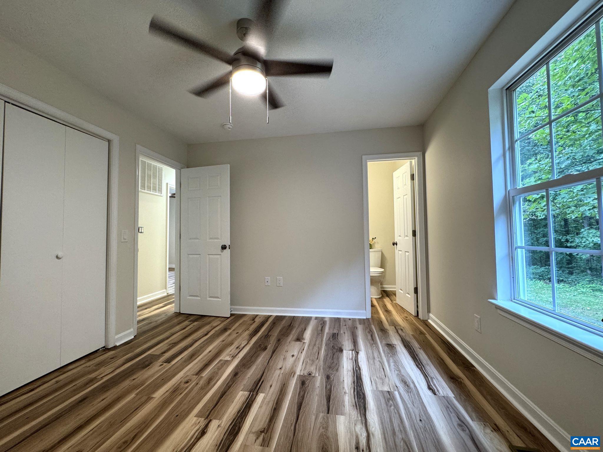 Master Bedroom with Attached Half Bath