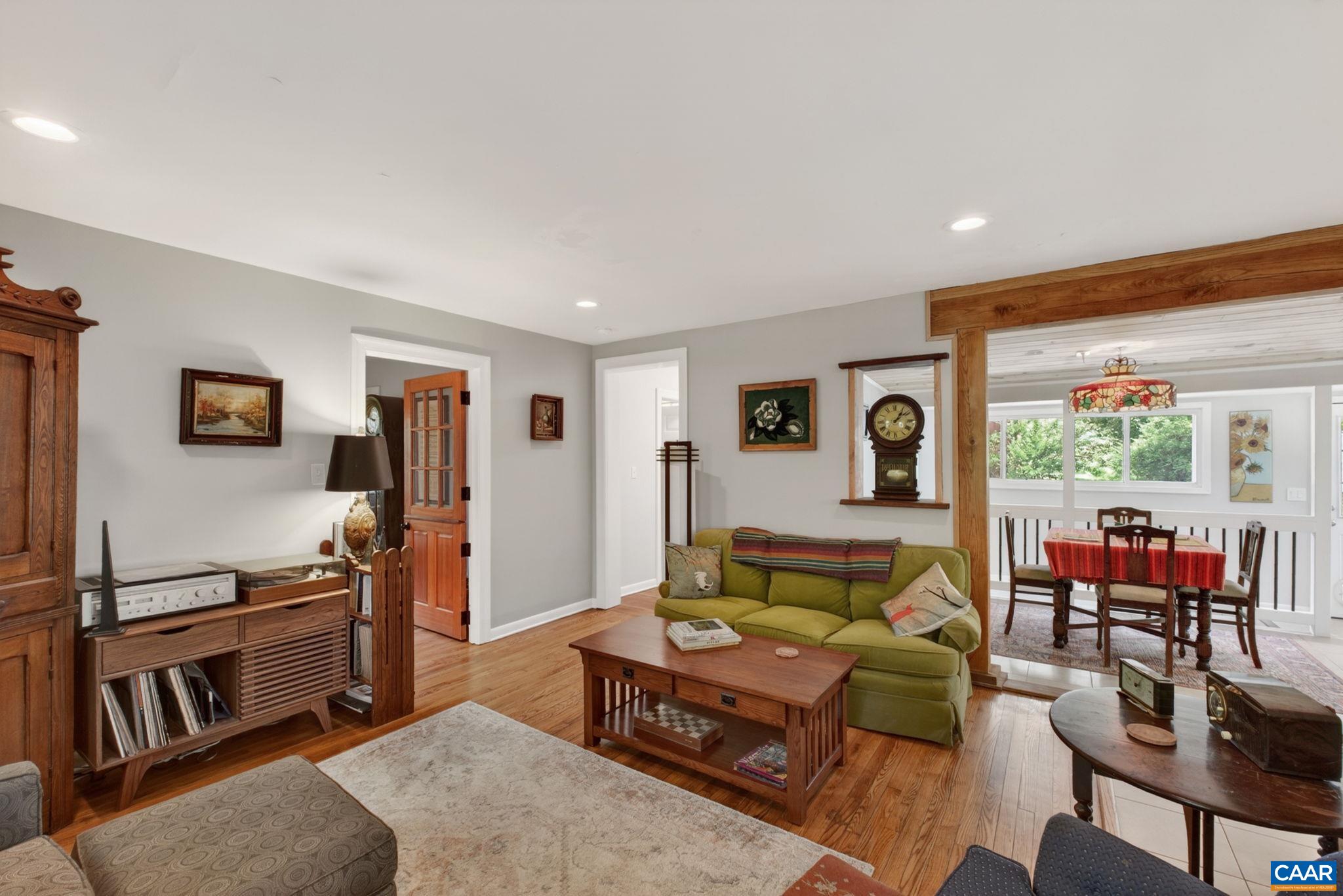 Comfortable living room with dining room beyond.