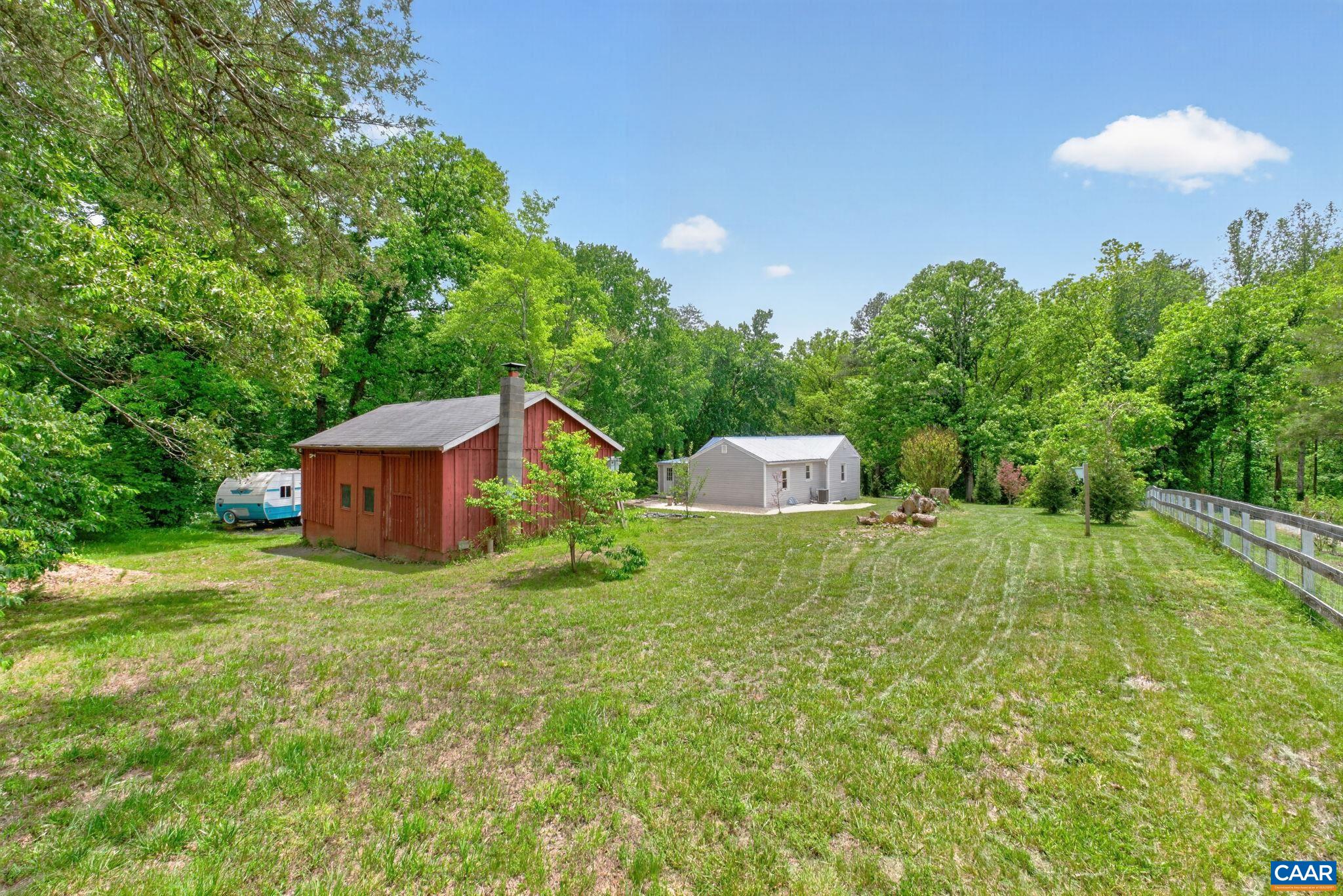Rear of home with barn.
