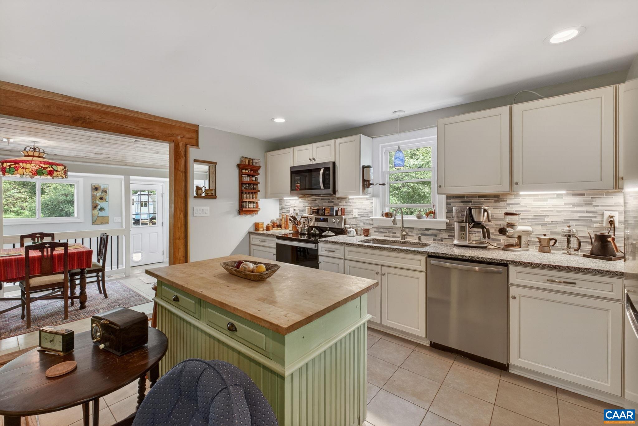 Kitchen island and dining room.