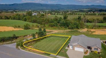 Single family lot in an attractive neighborhood with mountain views, a community center for gatherings, and small easy to maintain lots.
