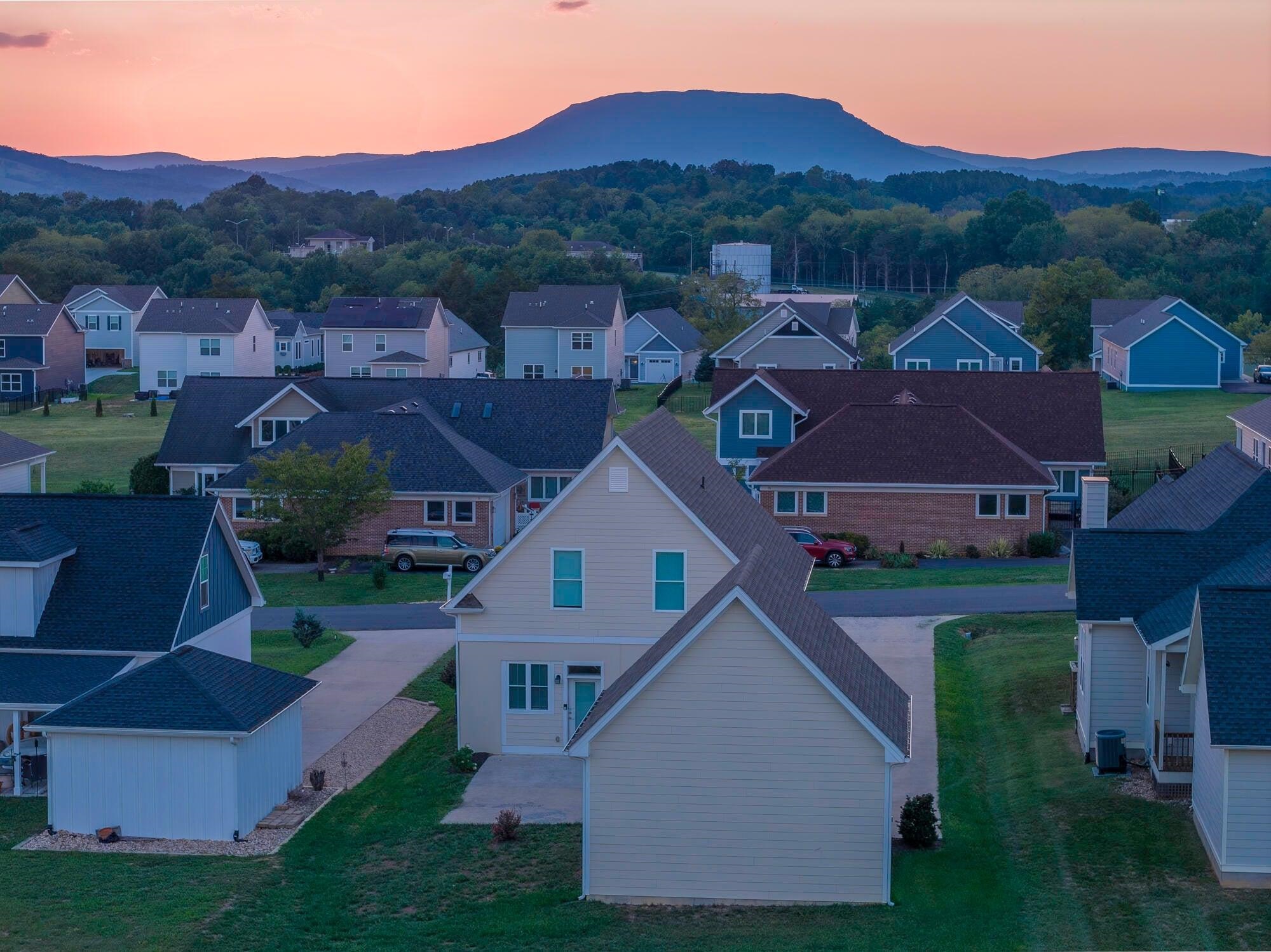 Upstairs, a spacious second-floor suite takes full advantage of the setting with stunning views of House Mountain.