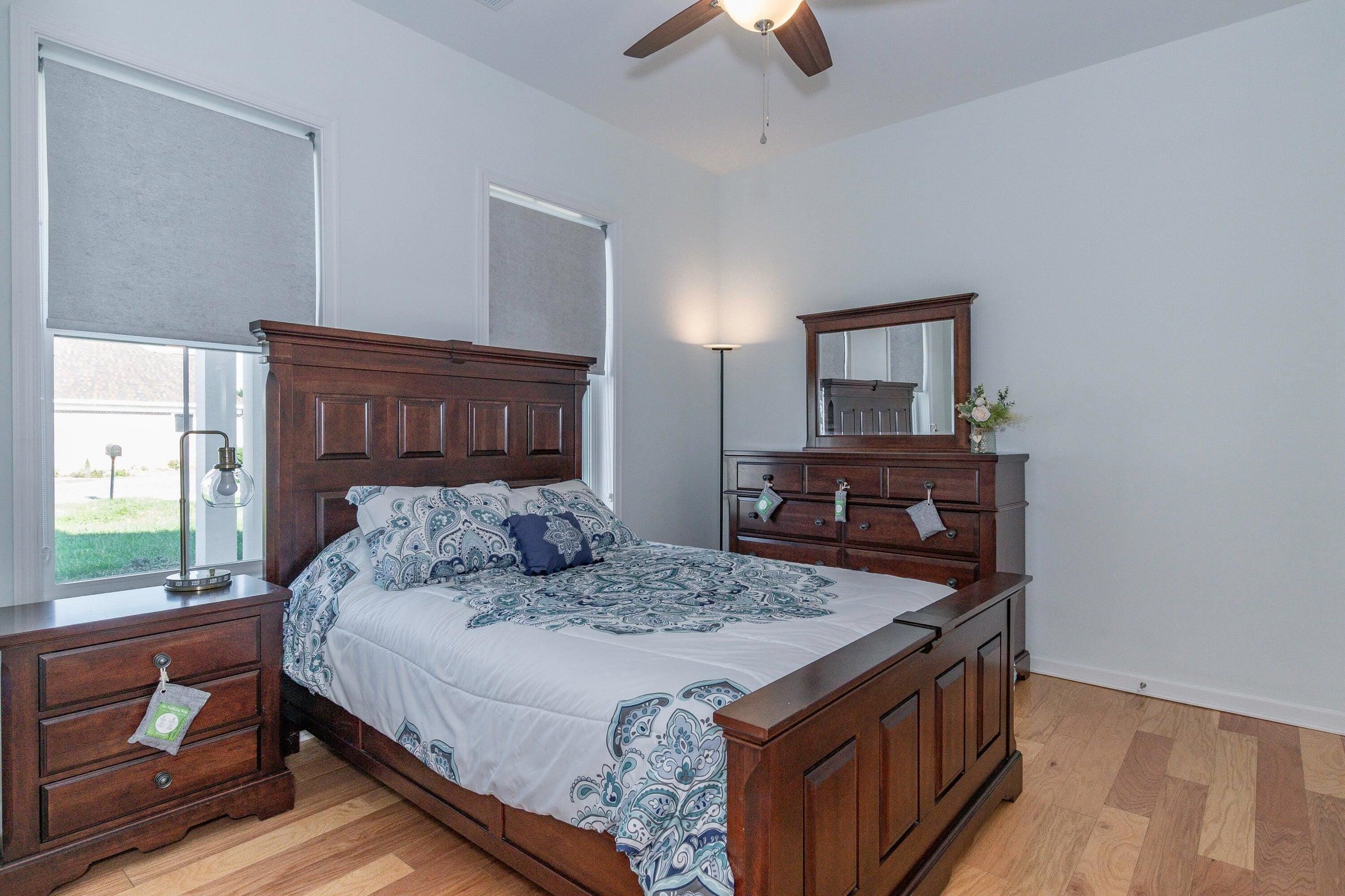 A first-floor primary suite with an en-suite walk-in shower offers convenience and accessibility without climbing stairs.
