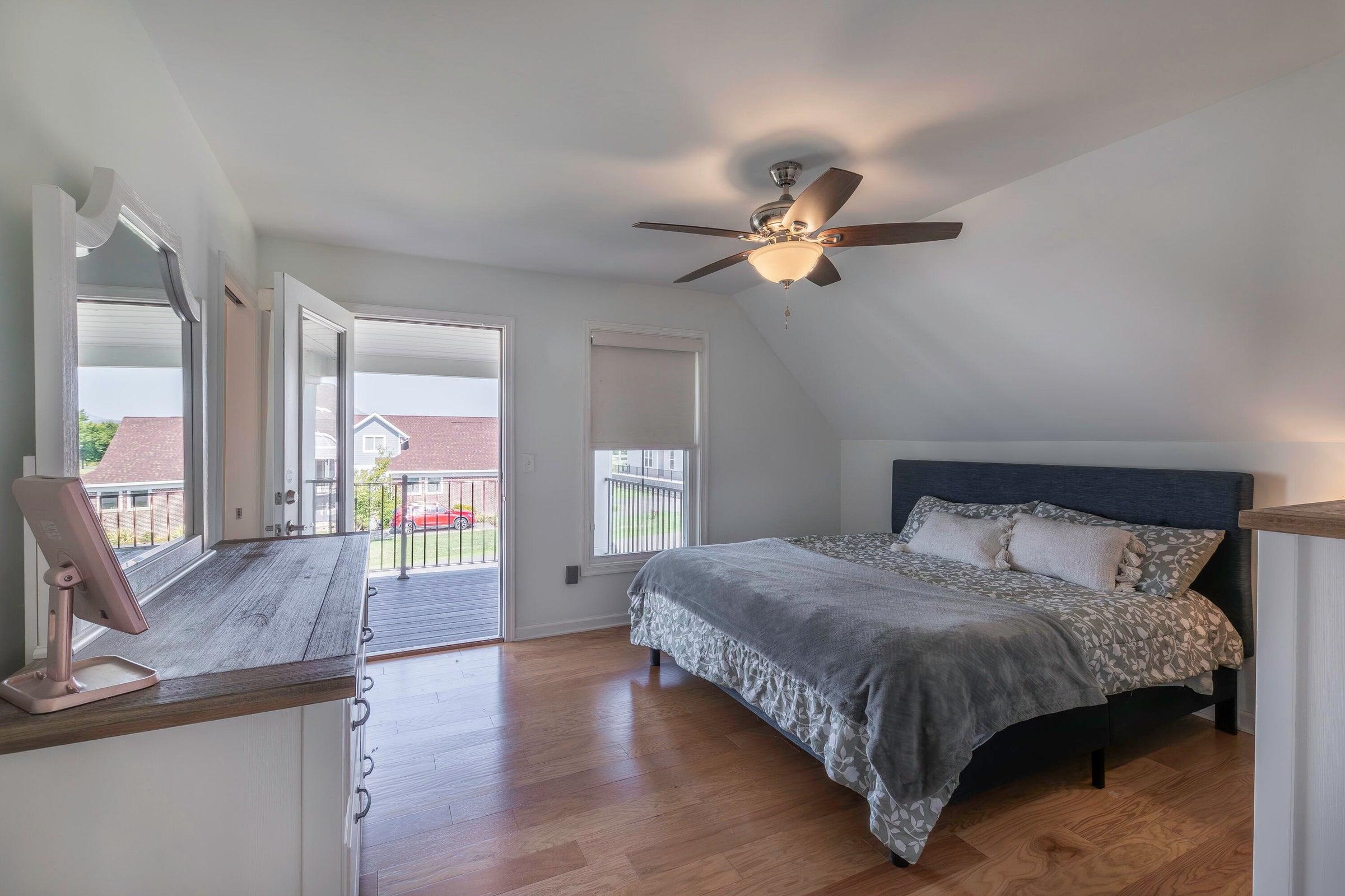 Upstairs, a second primary suite with en-suite full bath provides privacy for guests or a growing family.