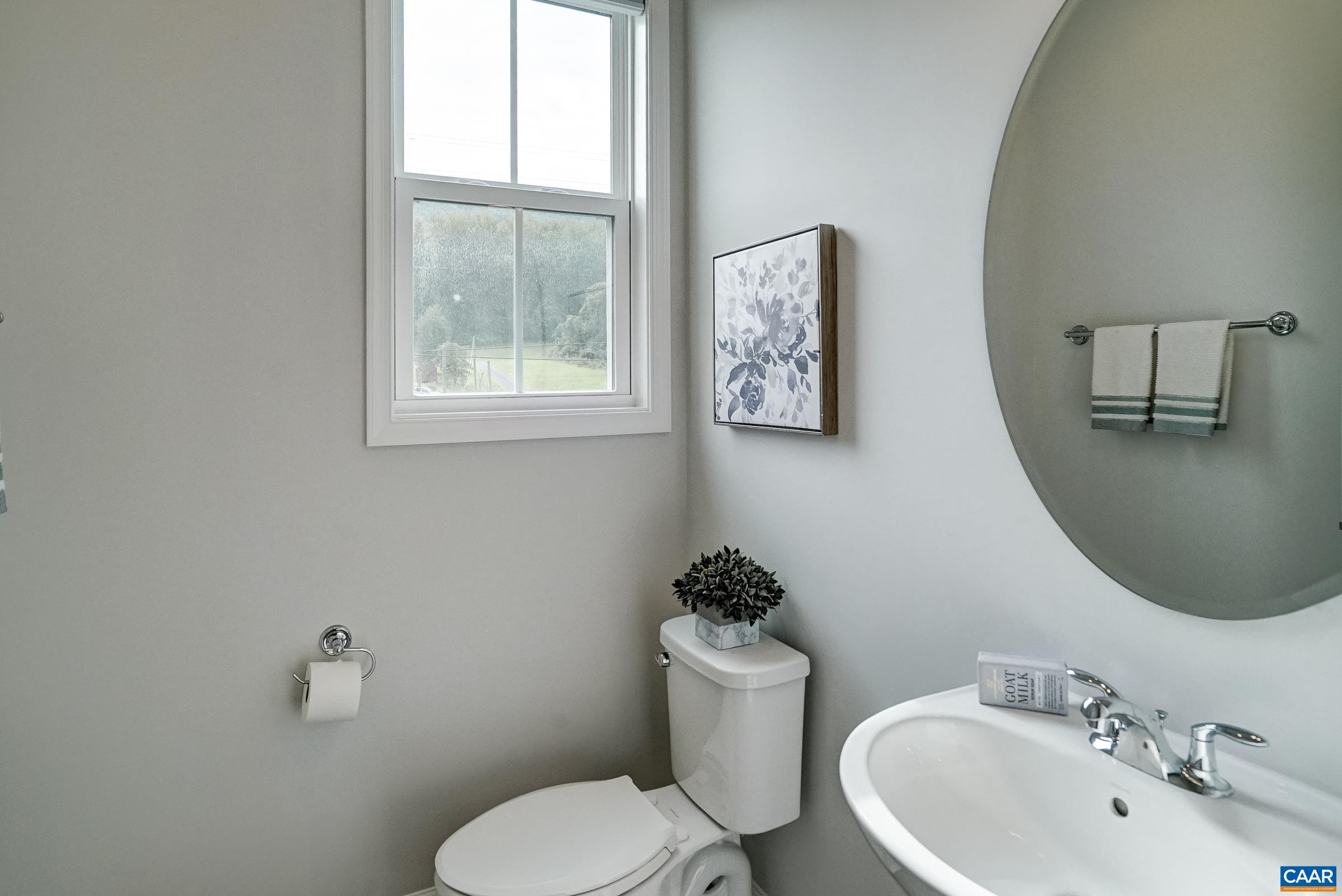 Main level half bathroom.