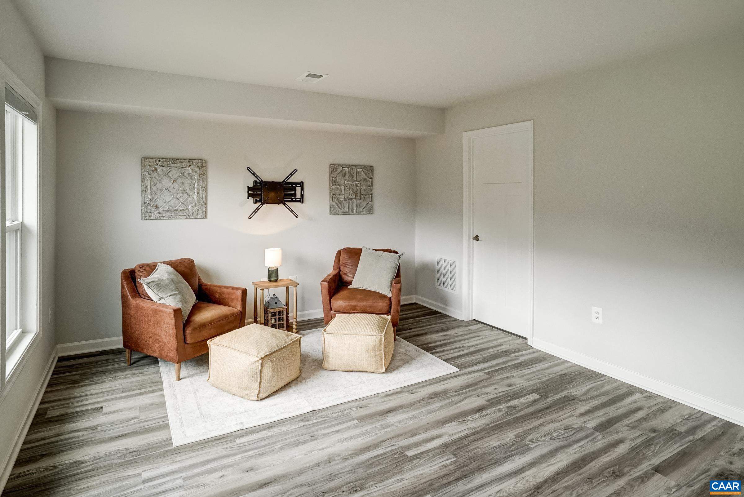 Ground level flex space could be a sitting room gym, or guest space.