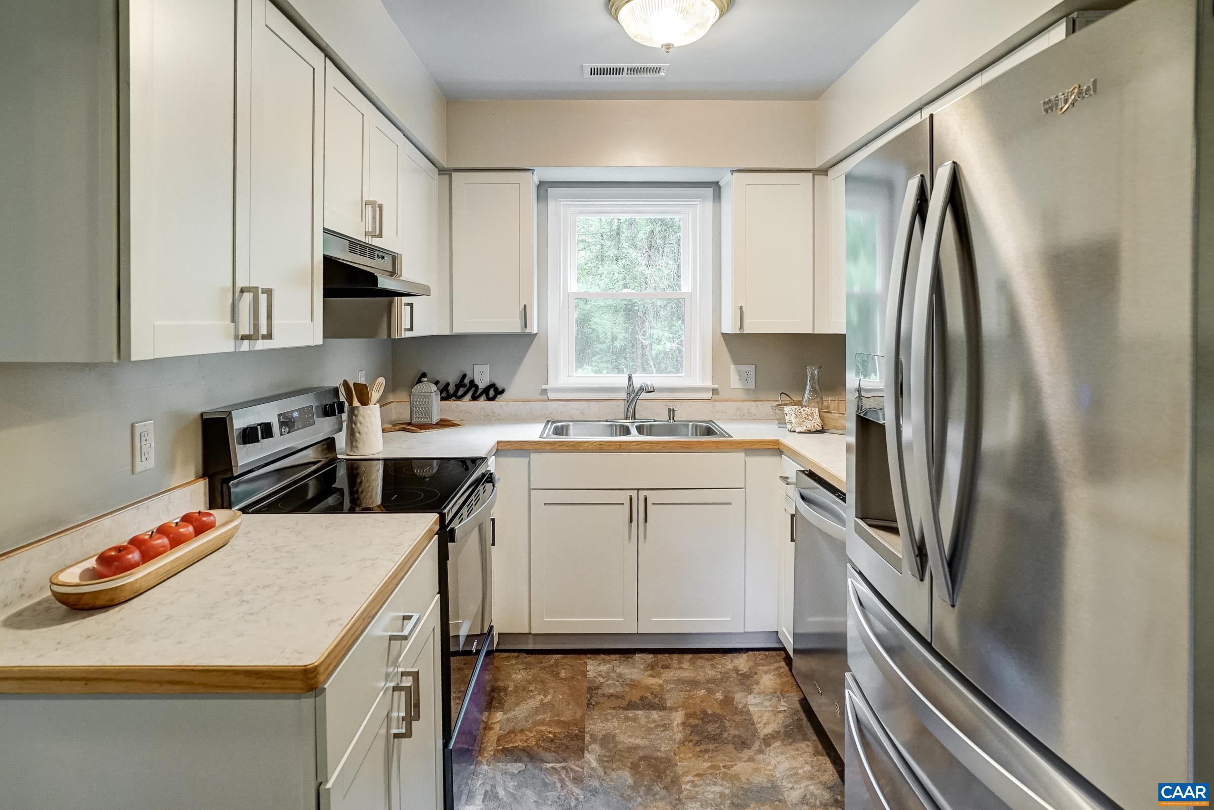 Renovated kitchen features new cabinets, new counters, new flooring and appliances too! Renovated kitchen features new cabinets, new counters, new flooring and appliances too!