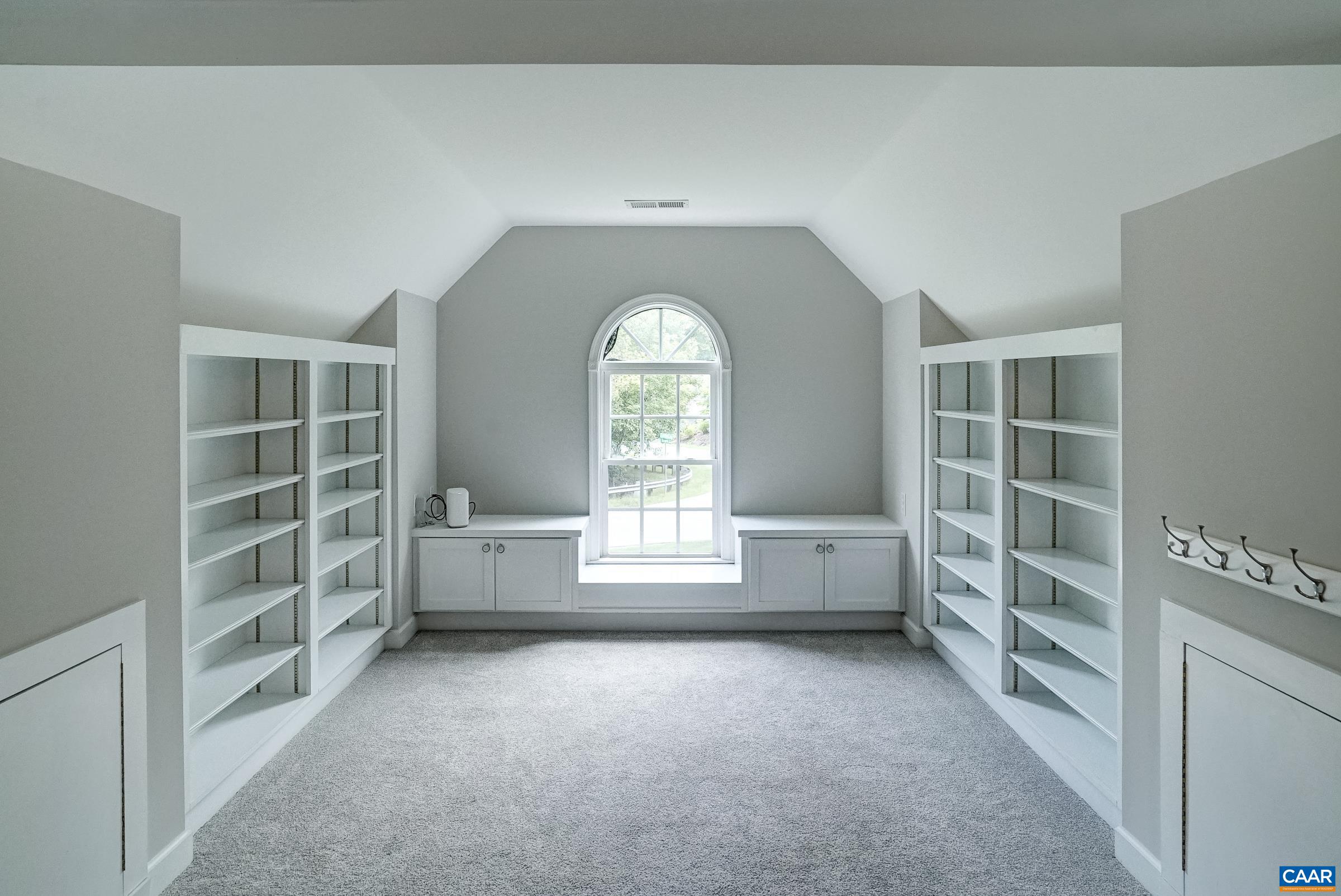 Large bonus room/bedroom 4 with built-ins could be a home office, media room or rec room.