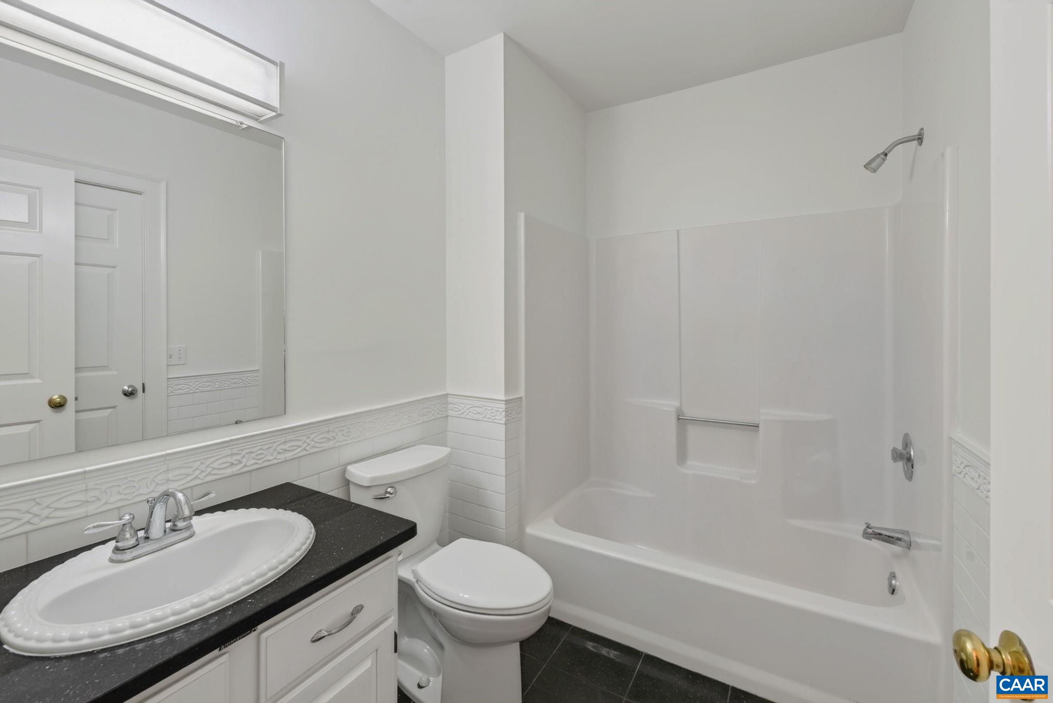 First Floor Primary Bathroom First Floor Primary Bathroom